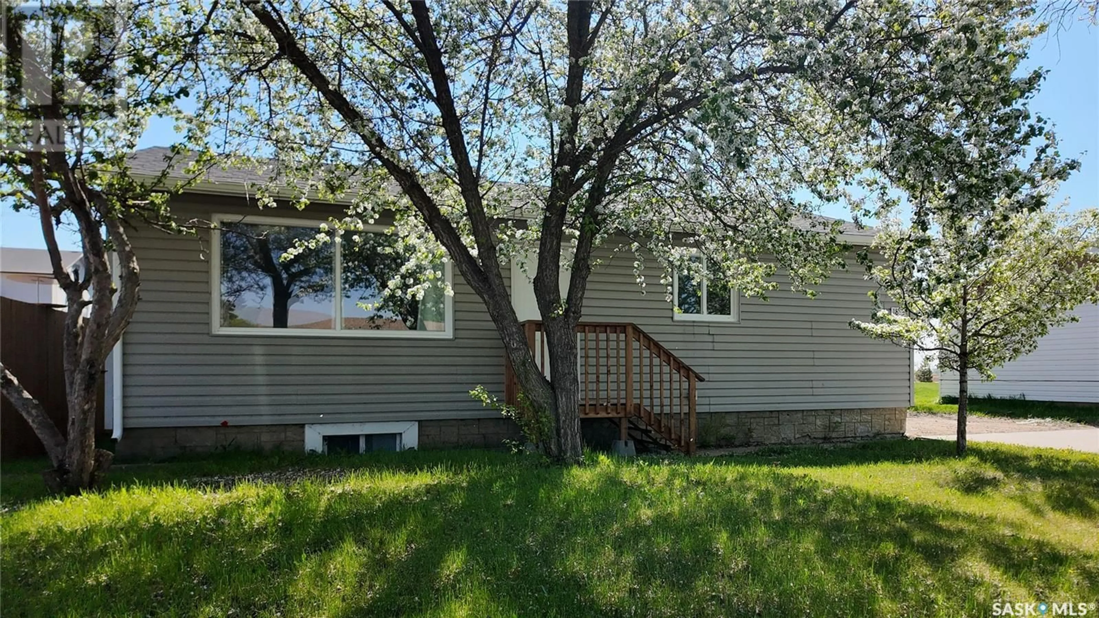 Home with vinyl exterior material, street for 1812 ST LAURENT DRIVE, North Battleford Saskatchewan S9A2Y6