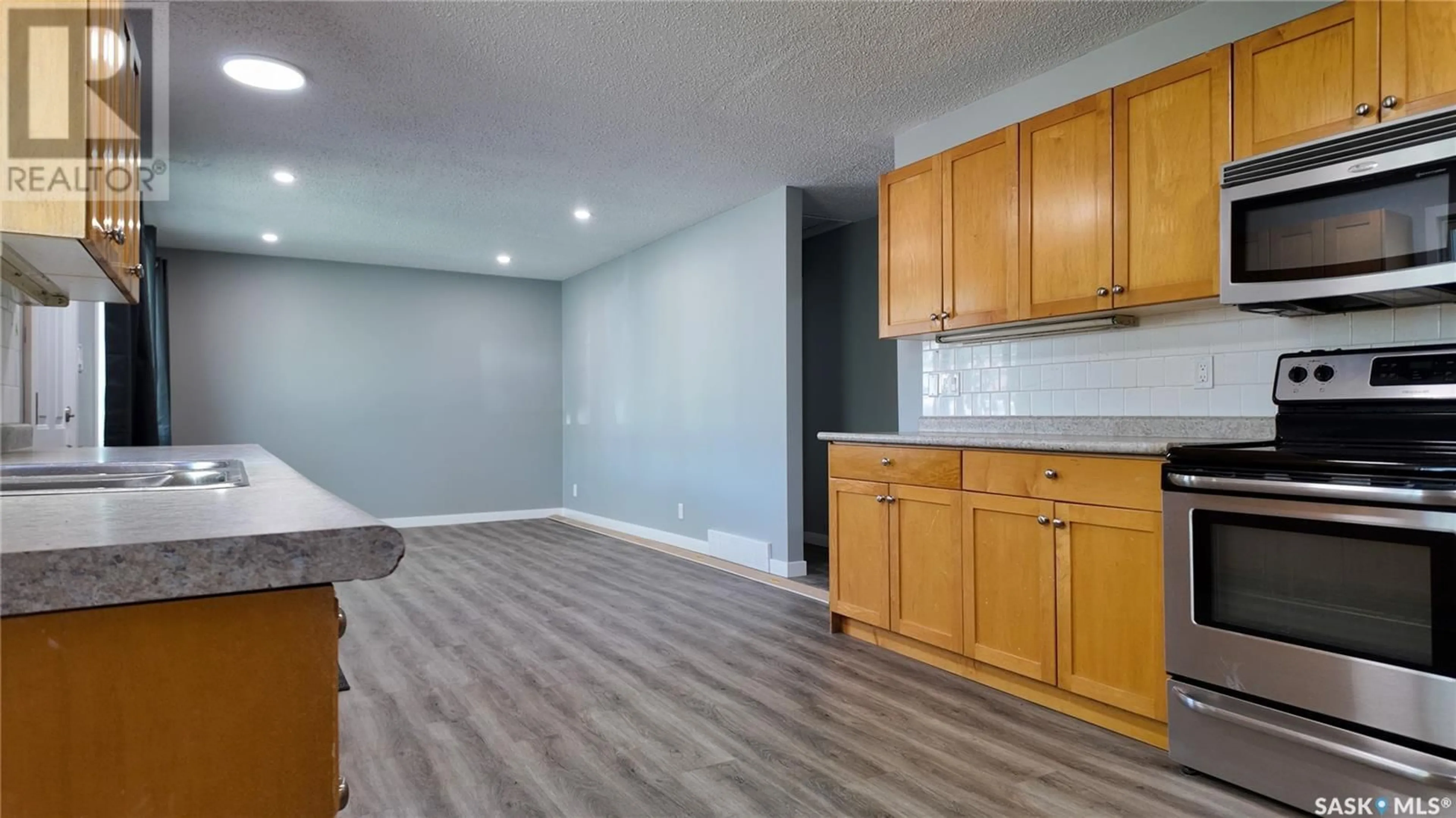 Open concept kitchen, unknown for 1812 ST LAURENT DRIVE, North Battleford Saskatchewan S9A2Y6