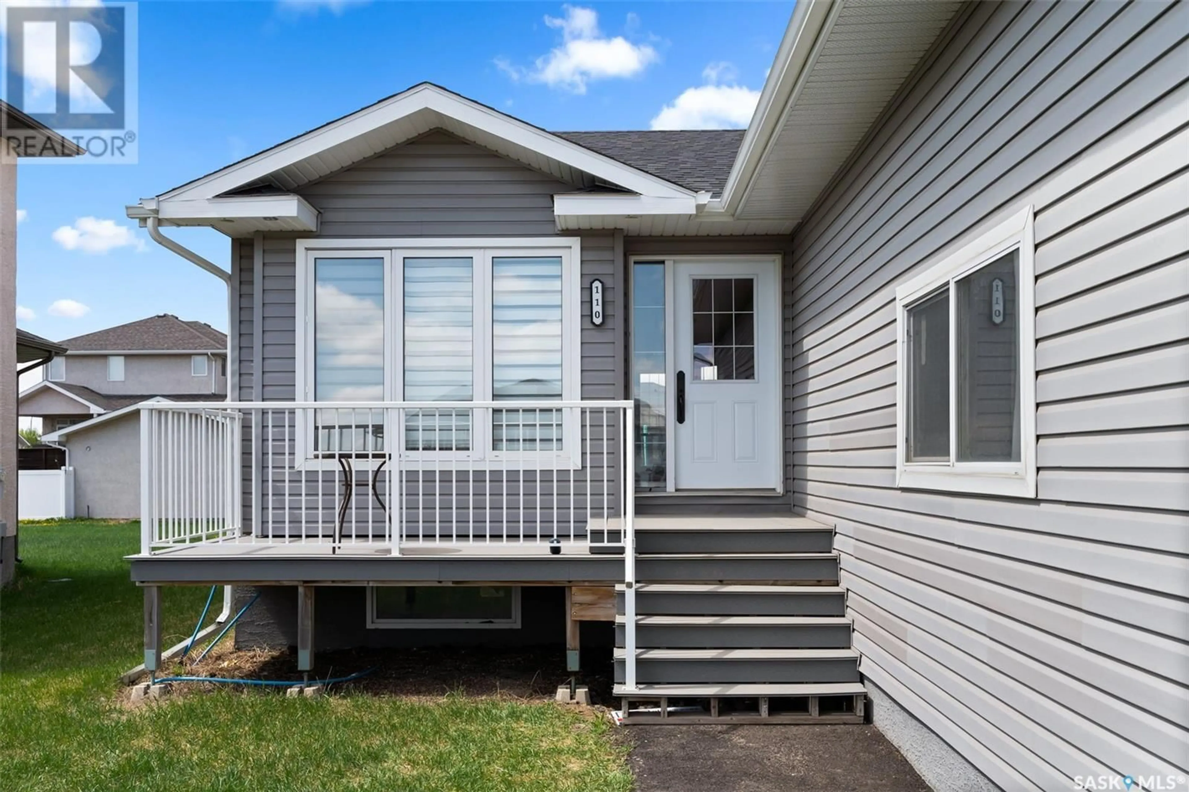 Home with vinyl exterior material, street for 110 CENTENNIAL DRIVE, Grand Coulee Saskatchewan S4M0A3