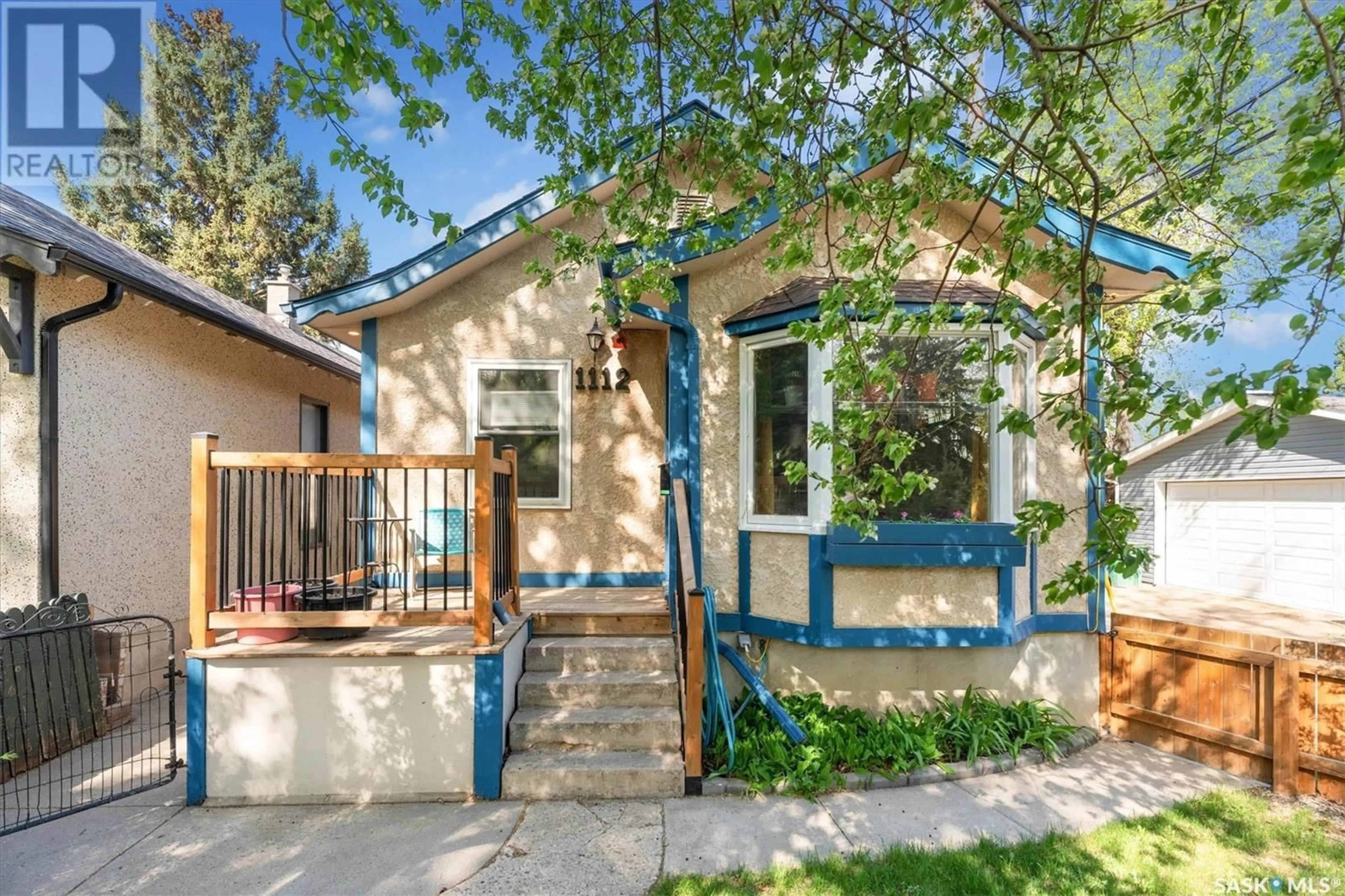 Home with vinyl exterior material, street for 1112 COY AVENUE, Saskatoon Saskatchewan S7M0H1