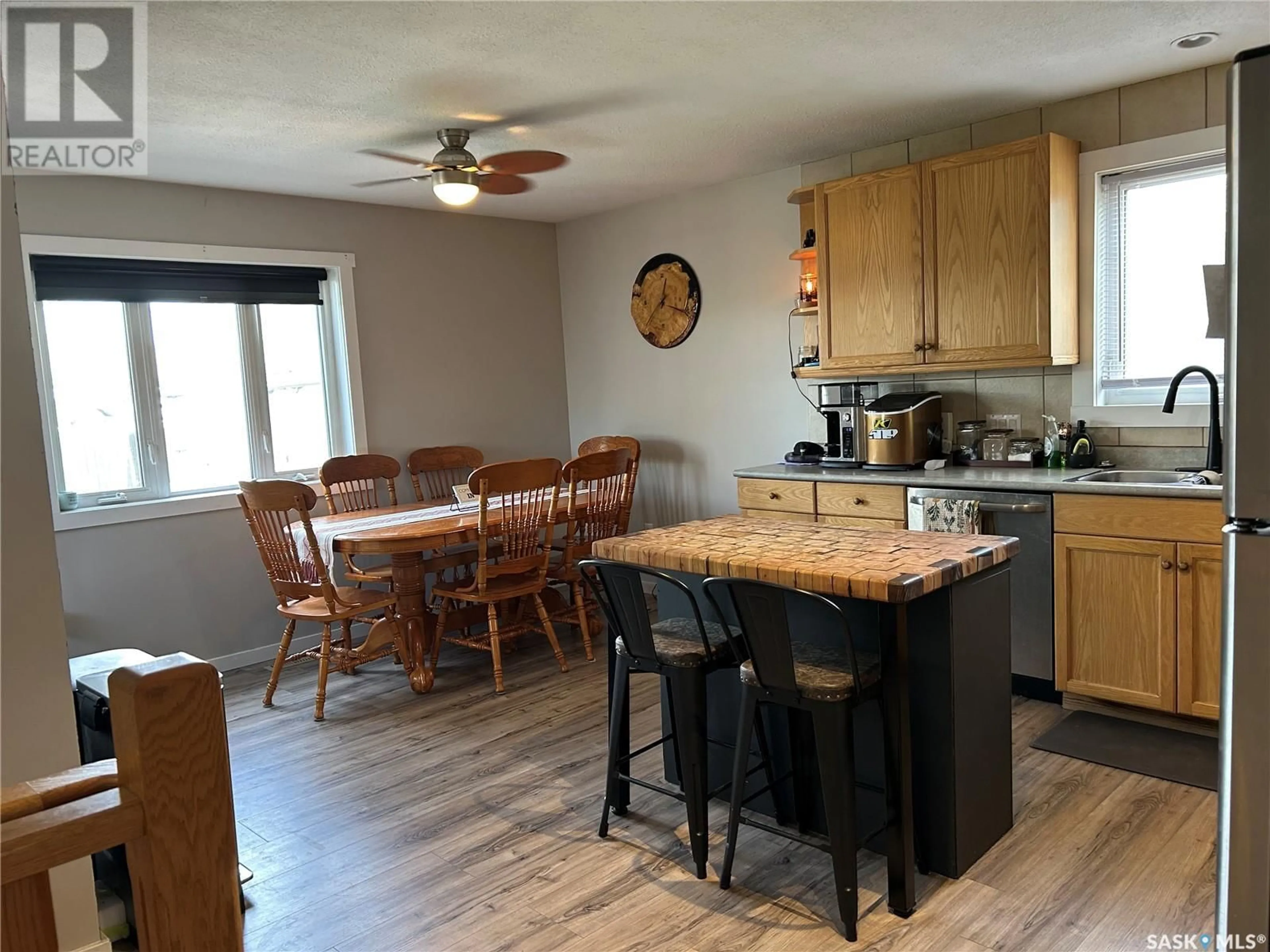 Open concept kitchen, wood/laminate floor for 605 98TH AVENUE, Tisdale Saskatchewan S0E1T0