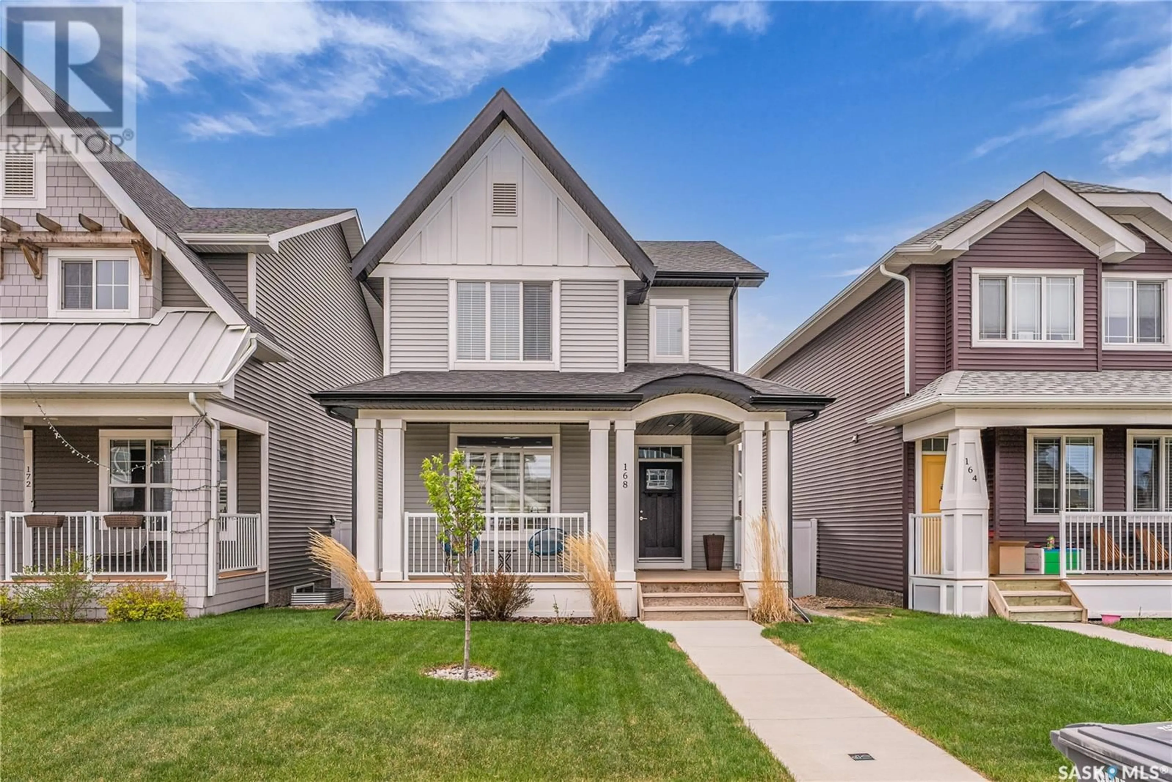 Home with vinyl exterior material, street for 168 DUBOIS CRESCENT, Saskatoon Saskatchewan S7V0R5