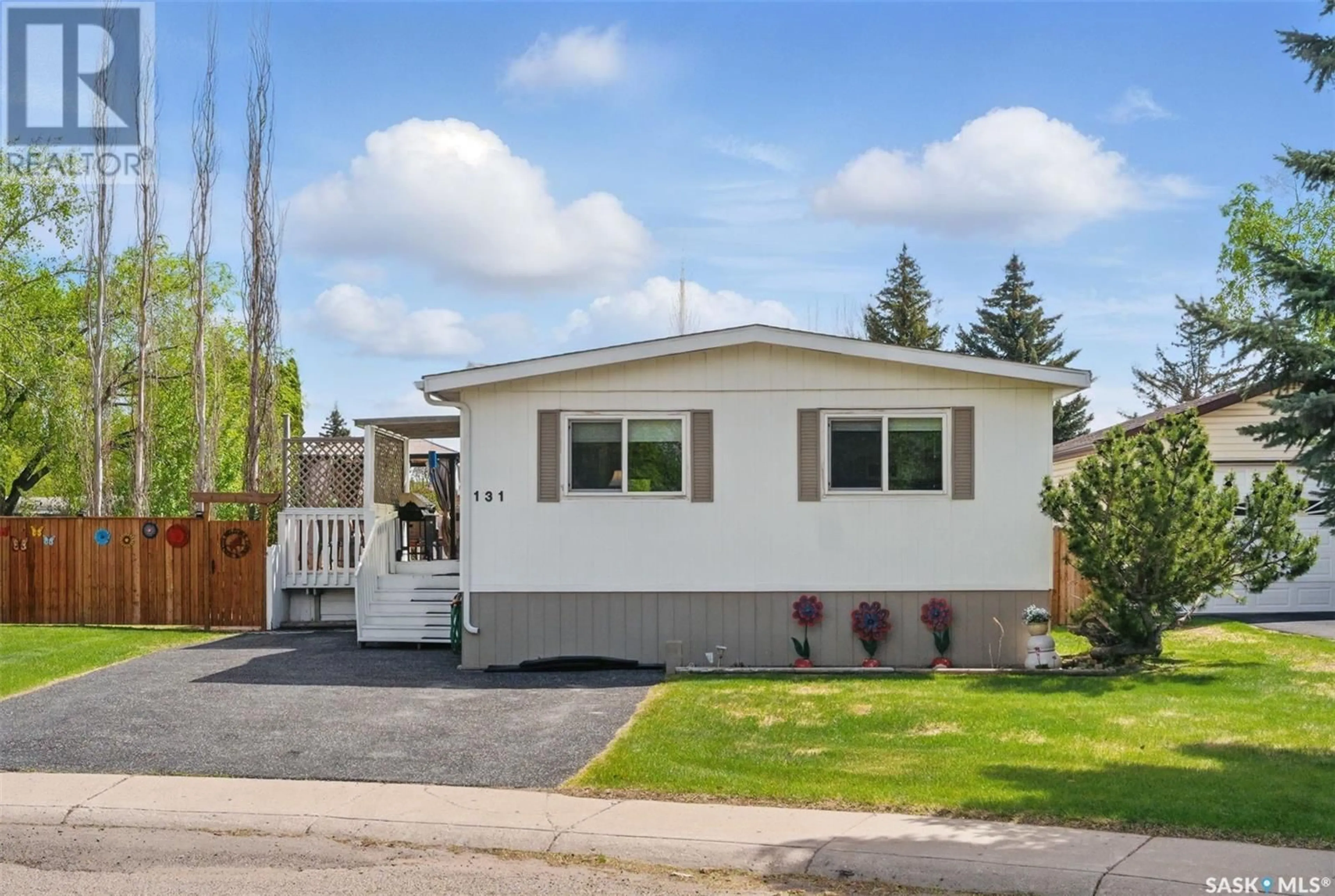 Home with vinyl exterior material, street for 131 LELAND TERRACE, Saskatoon Saskatchewan S7H5A1