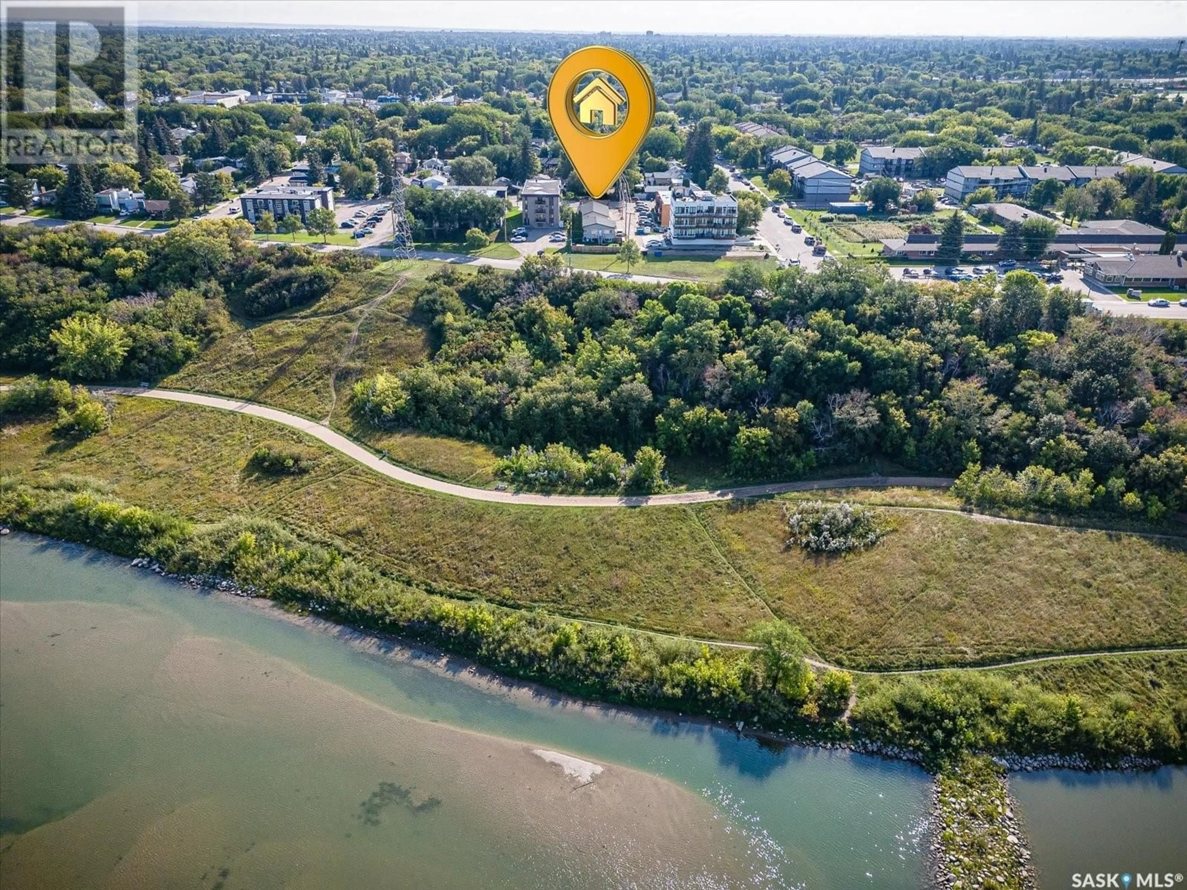 A pic from outside/outdoor area/front of a property/back of a property/a pic from drone, water/lake/river/ocean view for 2126 STE CECILIA AVENUE, Saskatoon Saskatchewan S7M0P2