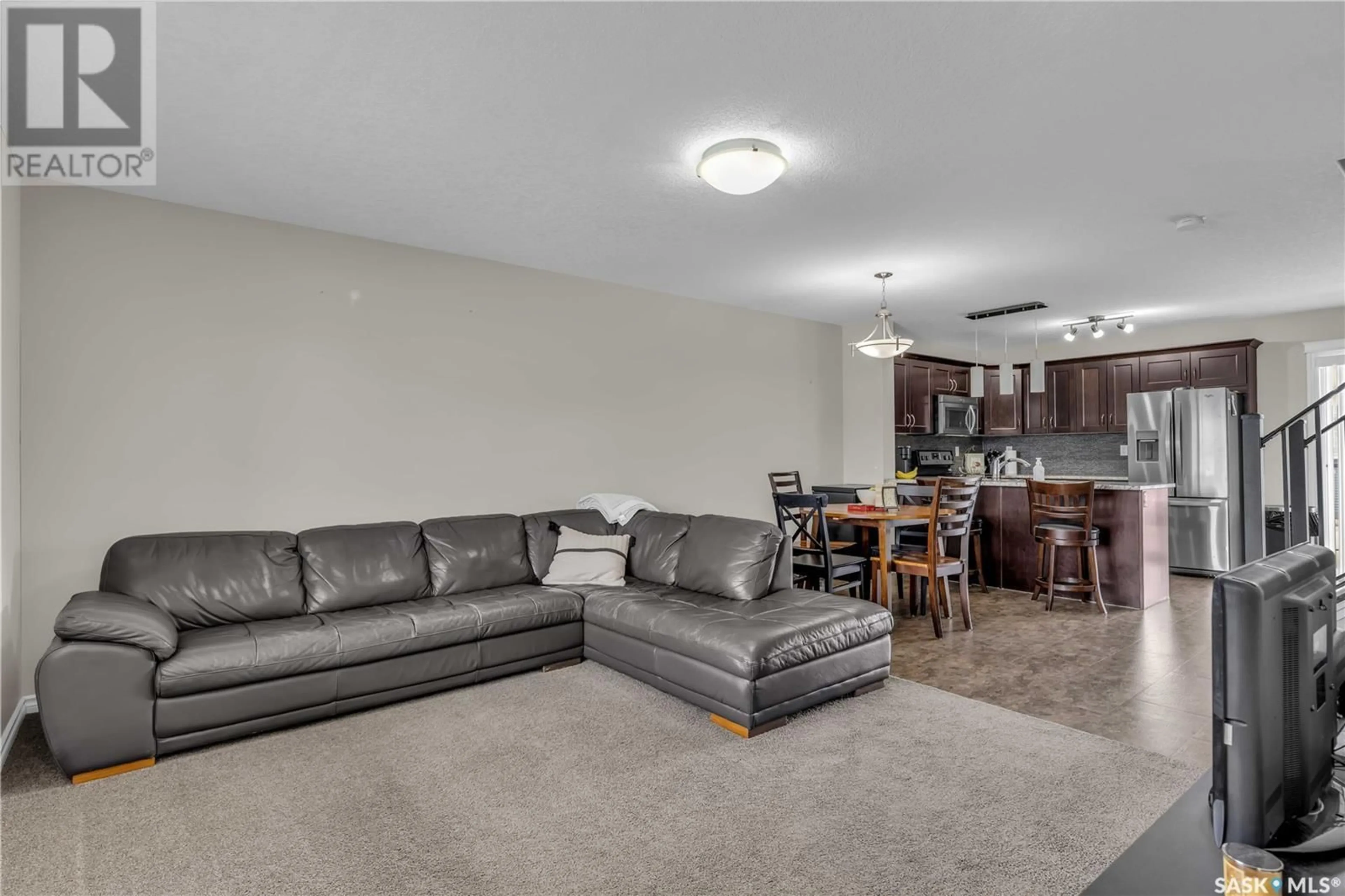 Living room with furniture, unknown for 210 - 509 RAJPUT WAY, Saskatoon Saskatchewan S7W0V7