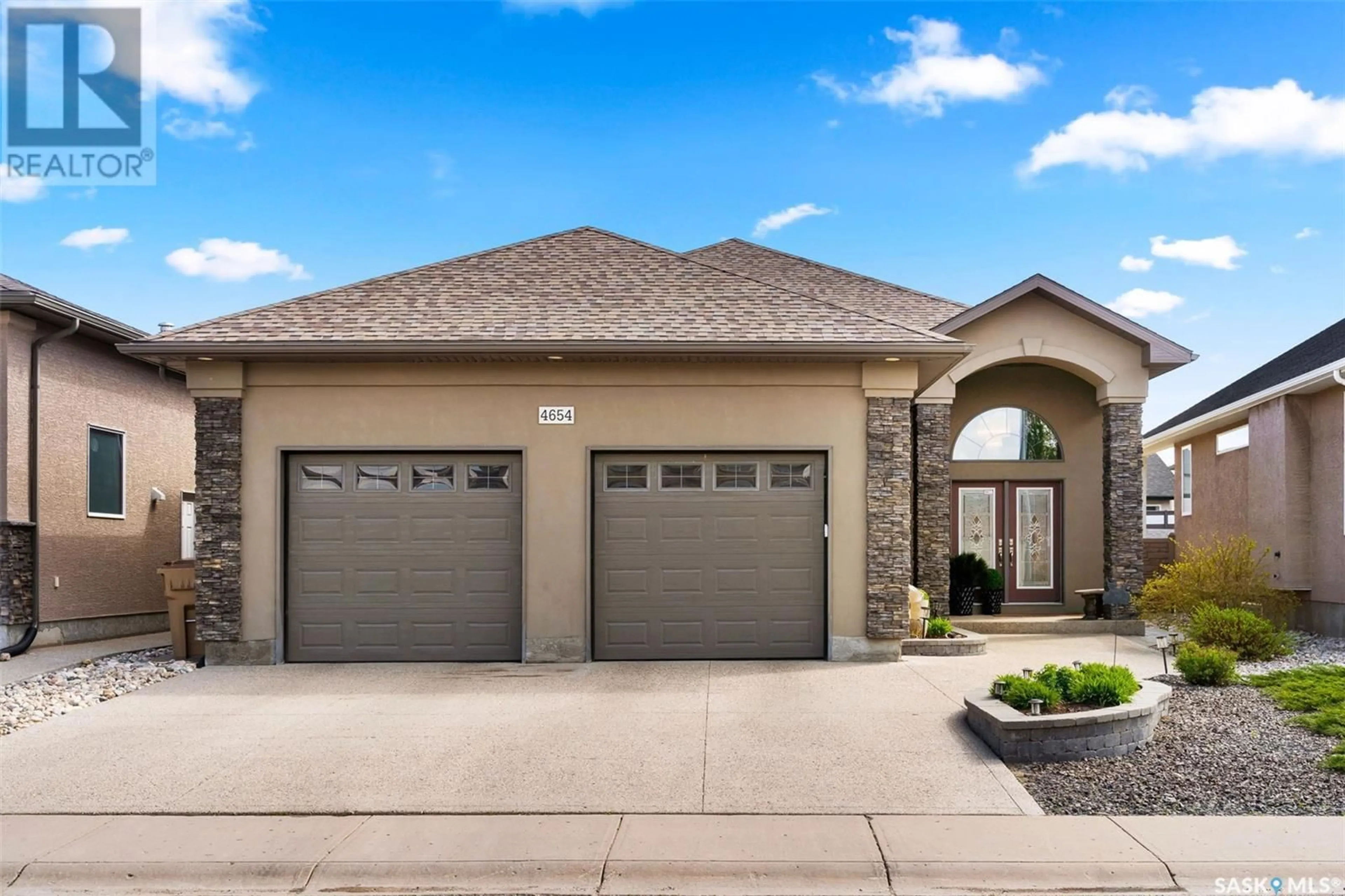Home with brick exterior material, street for 4654 MALCOLM DRIVE, Regina Saskatchewan S4W0B3