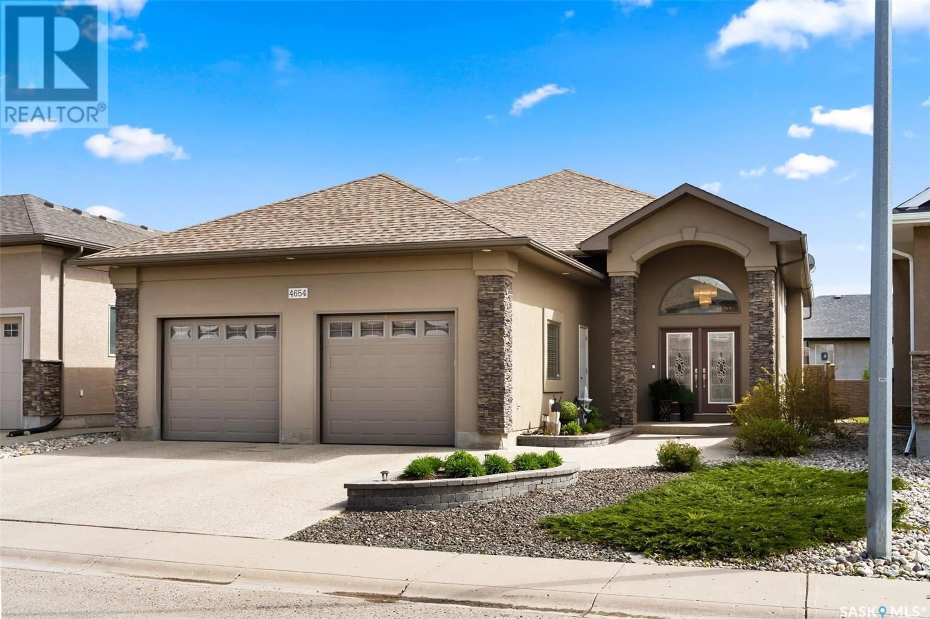 Home with brick exterior material, street for 4654 MALCOLM DRIVE, Regina Saskatchewan S4W0B3