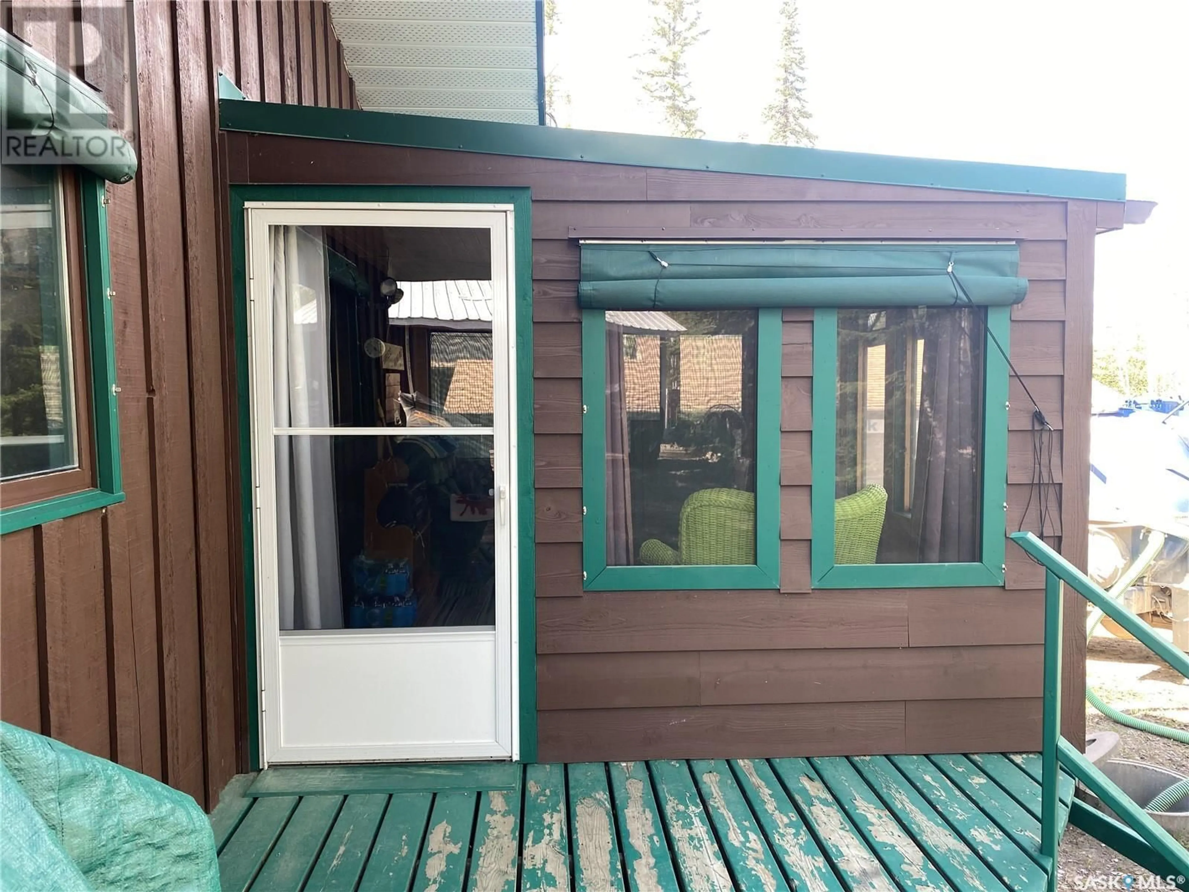 Home with vinyl exterior material, street for 10 - 3 ASPEN CRESCENT, Whelan Bay Saskatchewan S0J1T0