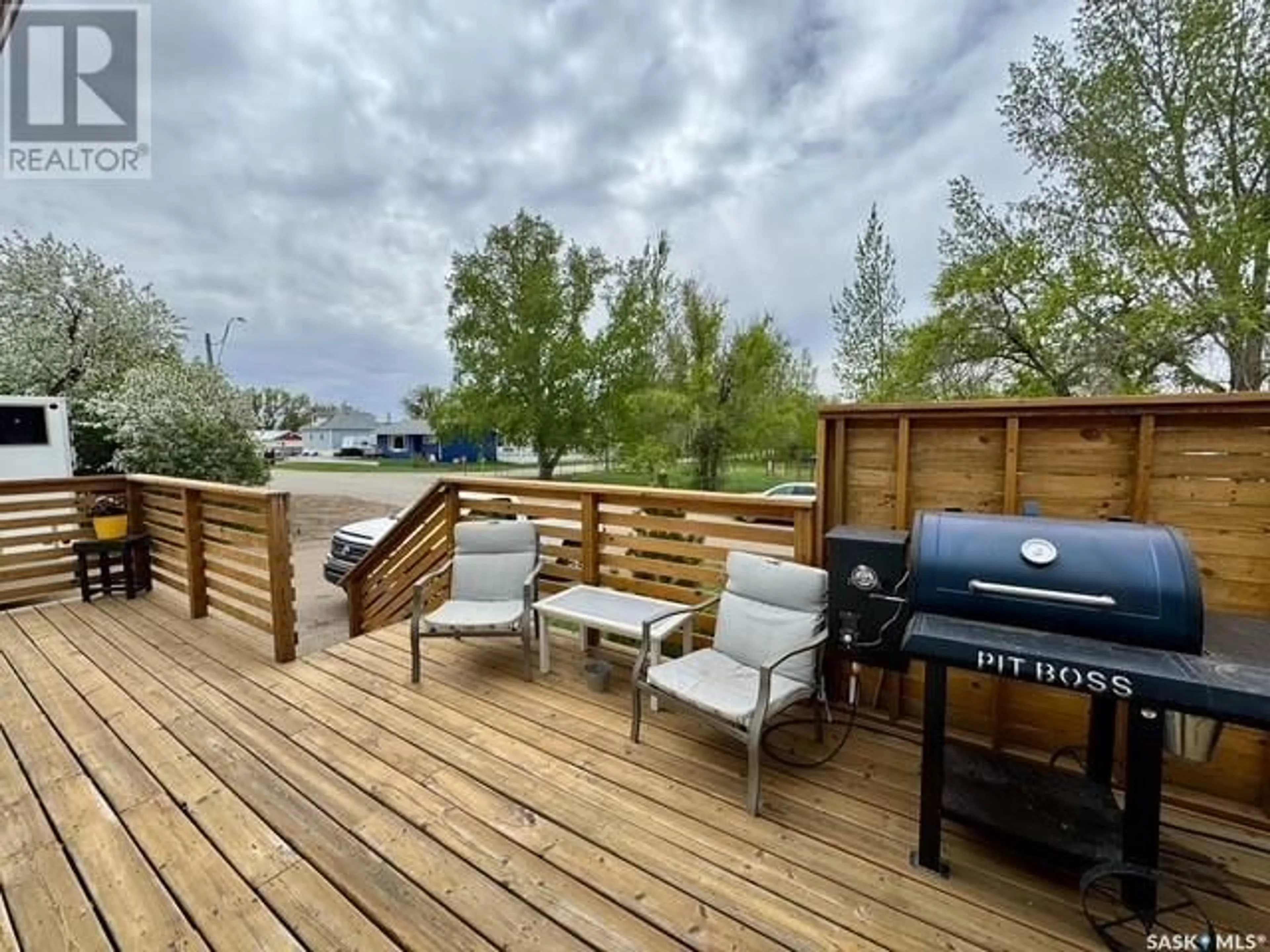 Patio, water/lake/river/ocean view for 102 BRAUN STREET, Waldeck Saskatchewan S0H4J0