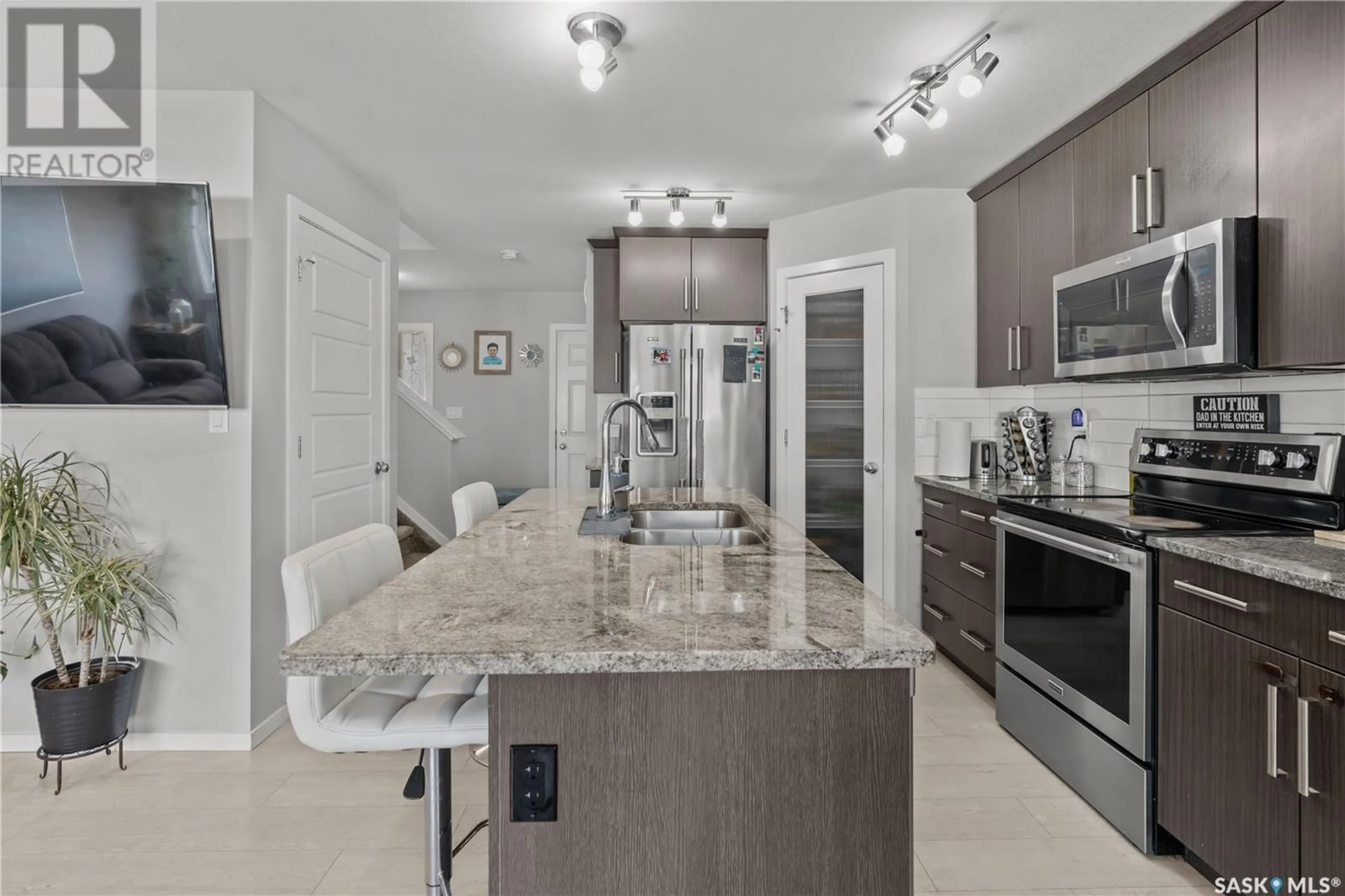 Open concept kitchen, ceramic/tile floor for 3347 GREEN SANDCHERRY STREET, Regina Saskatchewan S4V3M2