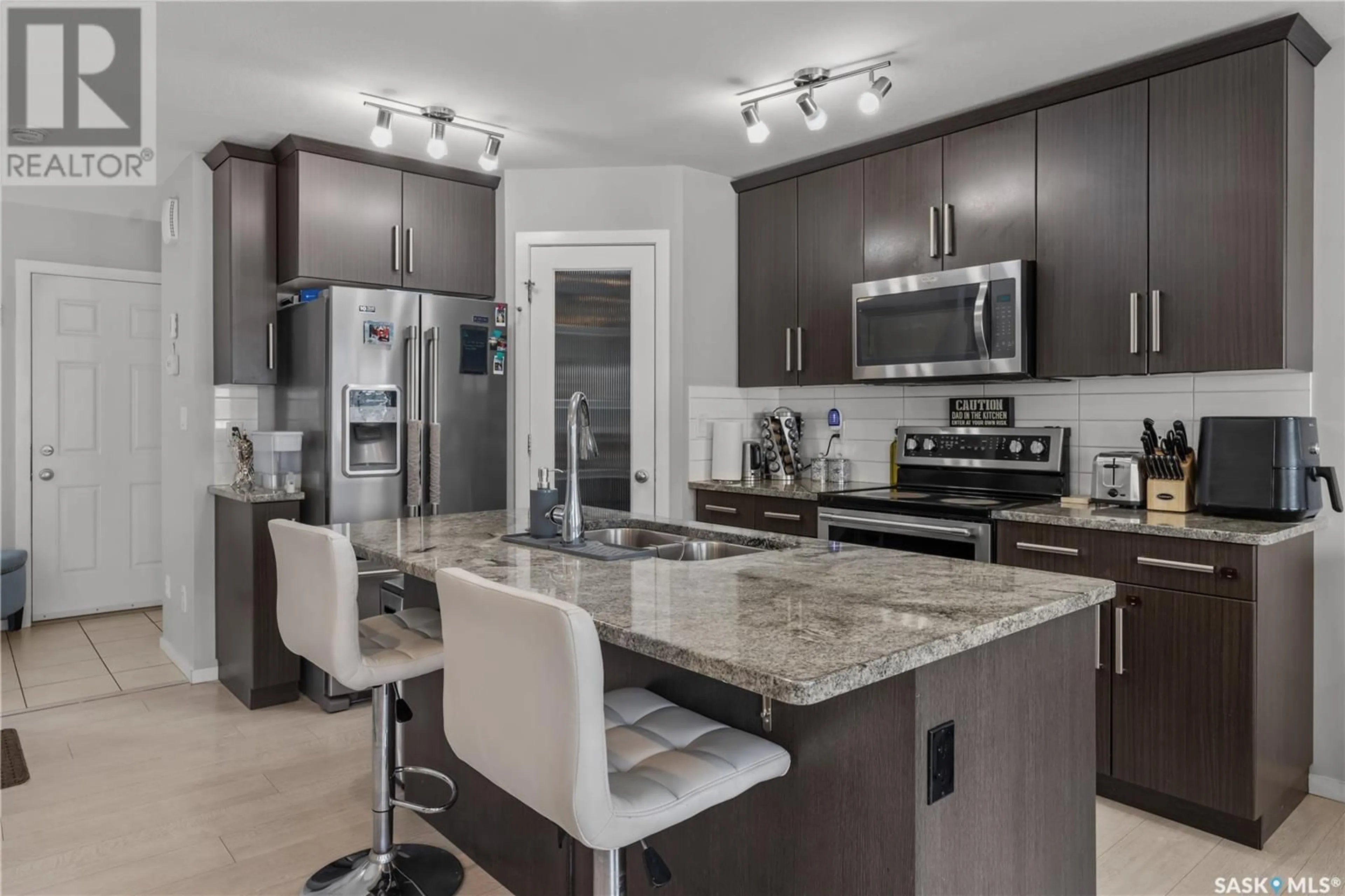Open concept kitchen, ceramic/tile floor for 3347 GREEN SANDCHERRY STREET, Regina Saskatchewan S4V3M2