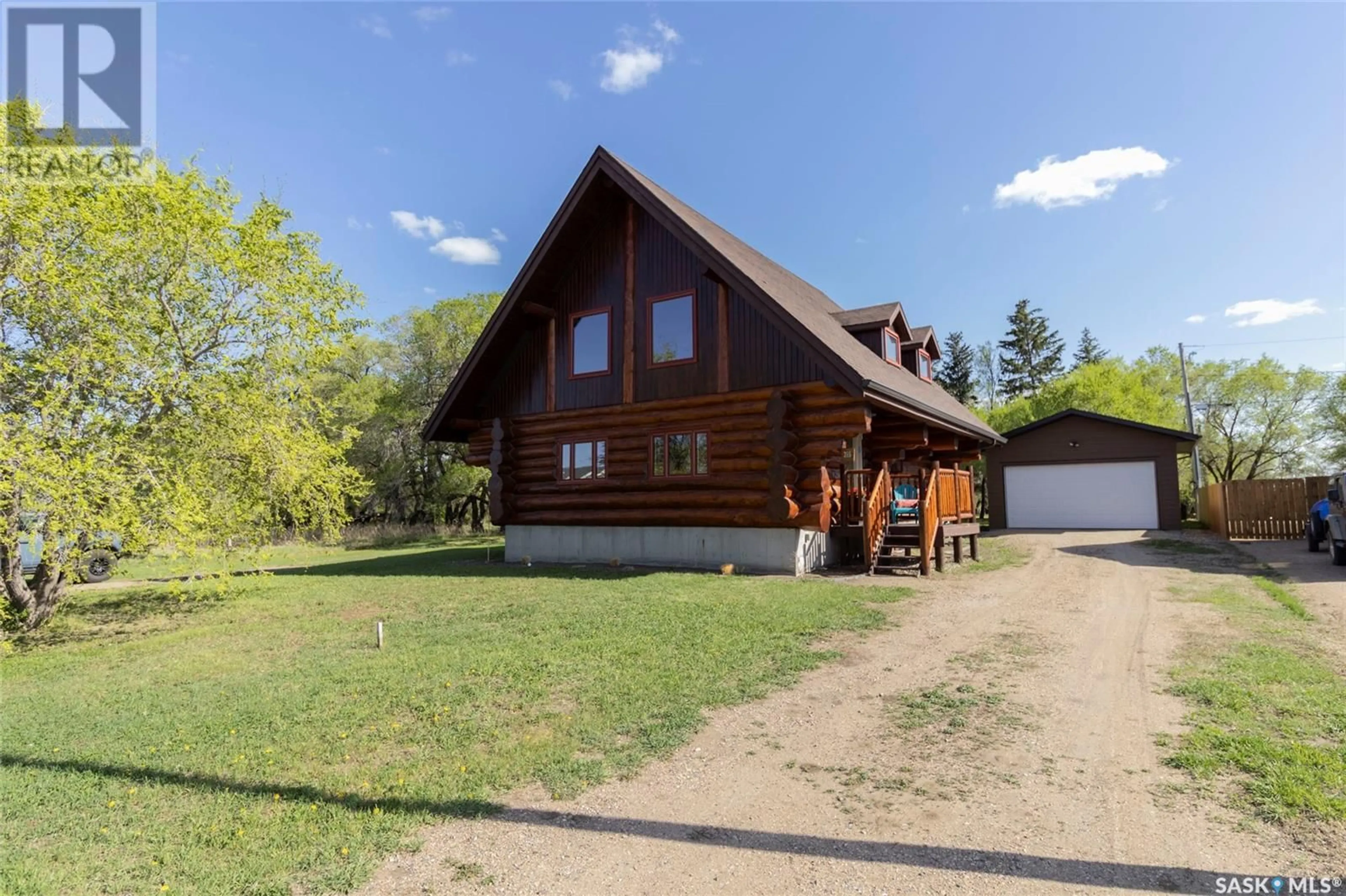 A pic from outside/outdoor area/front of a property/back of a property/a pic from drone, building for 355 CLARK AVENUE, Asquith Saskatchewan S0K0J0