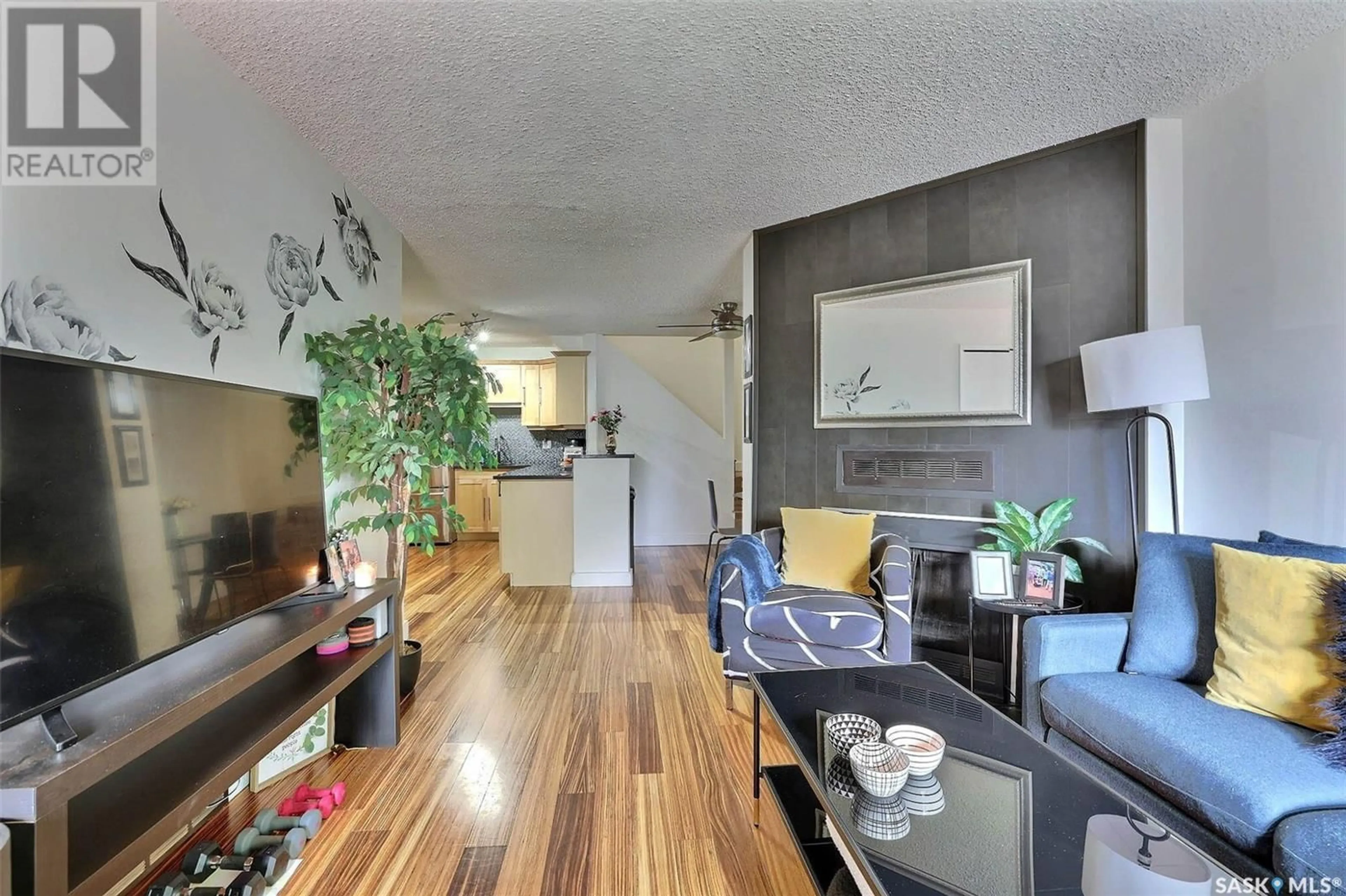 Open concept kitchen, wood/laminate floor for 198 CEDAR MEADOW DRIVE, Regina Saskatchewan S4X3J6