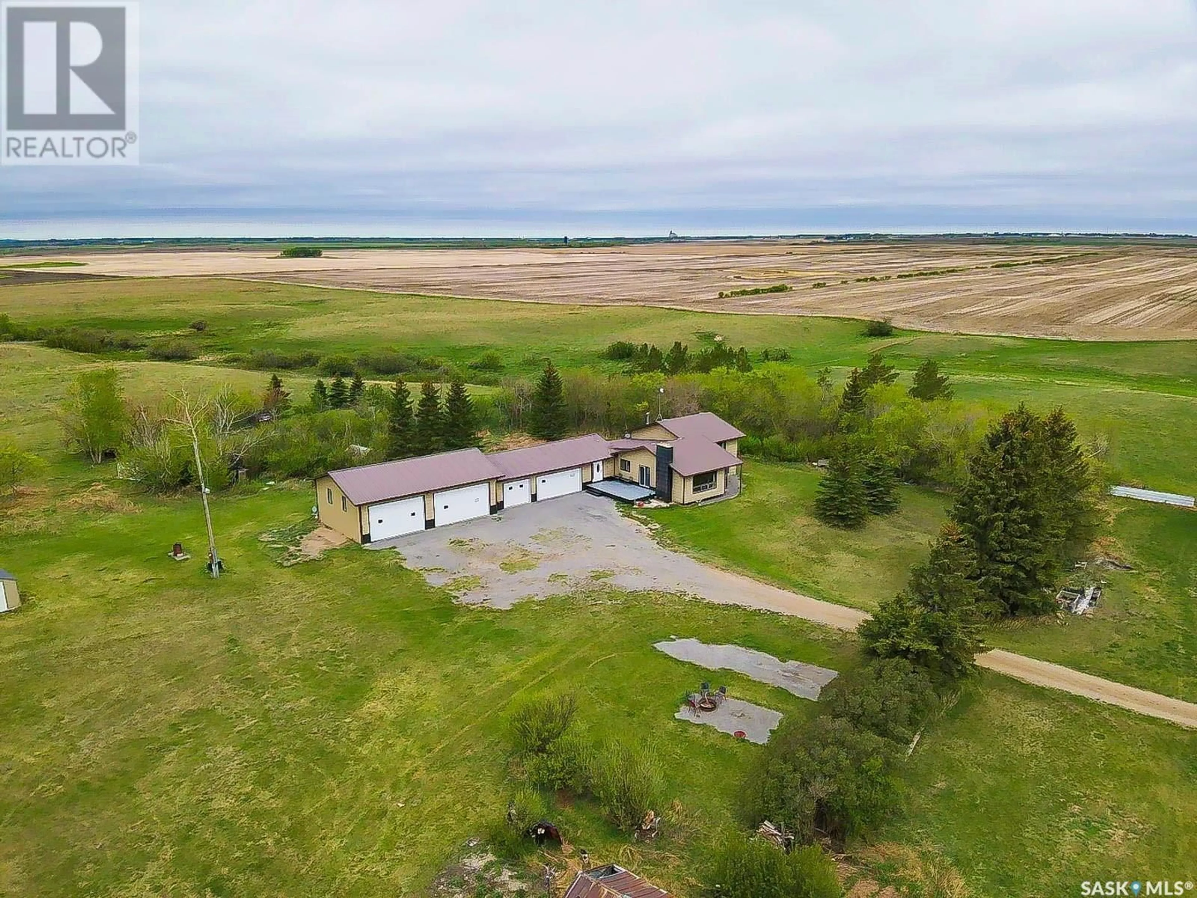 A pic from outside/outdoor area/front of a property/back of a property/a pic from drone, water/lake/river/ocean view for CREEK VIEW ACREAGE, Edenwold Rm No. 158 Saskatchewan S4L5B1
