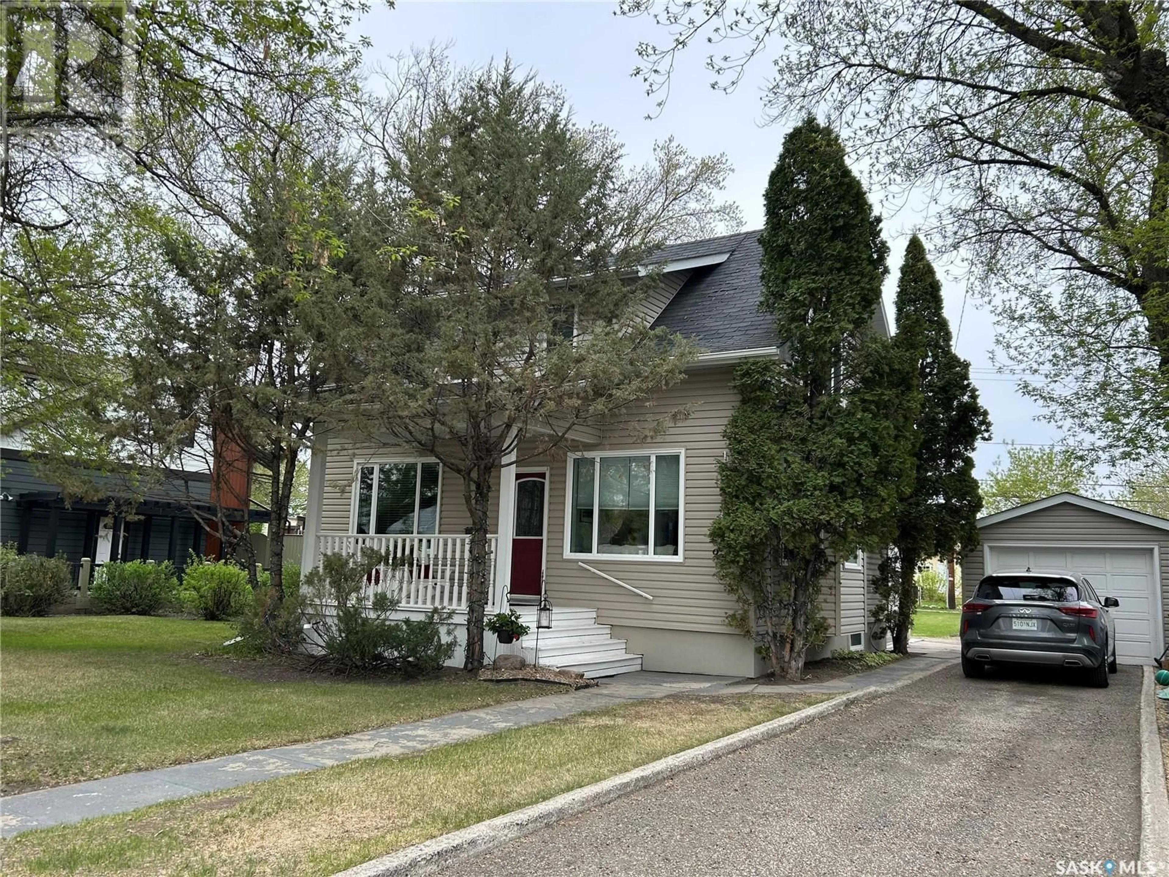 Home with vinyl exterior material, street for 922 9TH STREET, Humboldt Saskatchewan S0K2A0