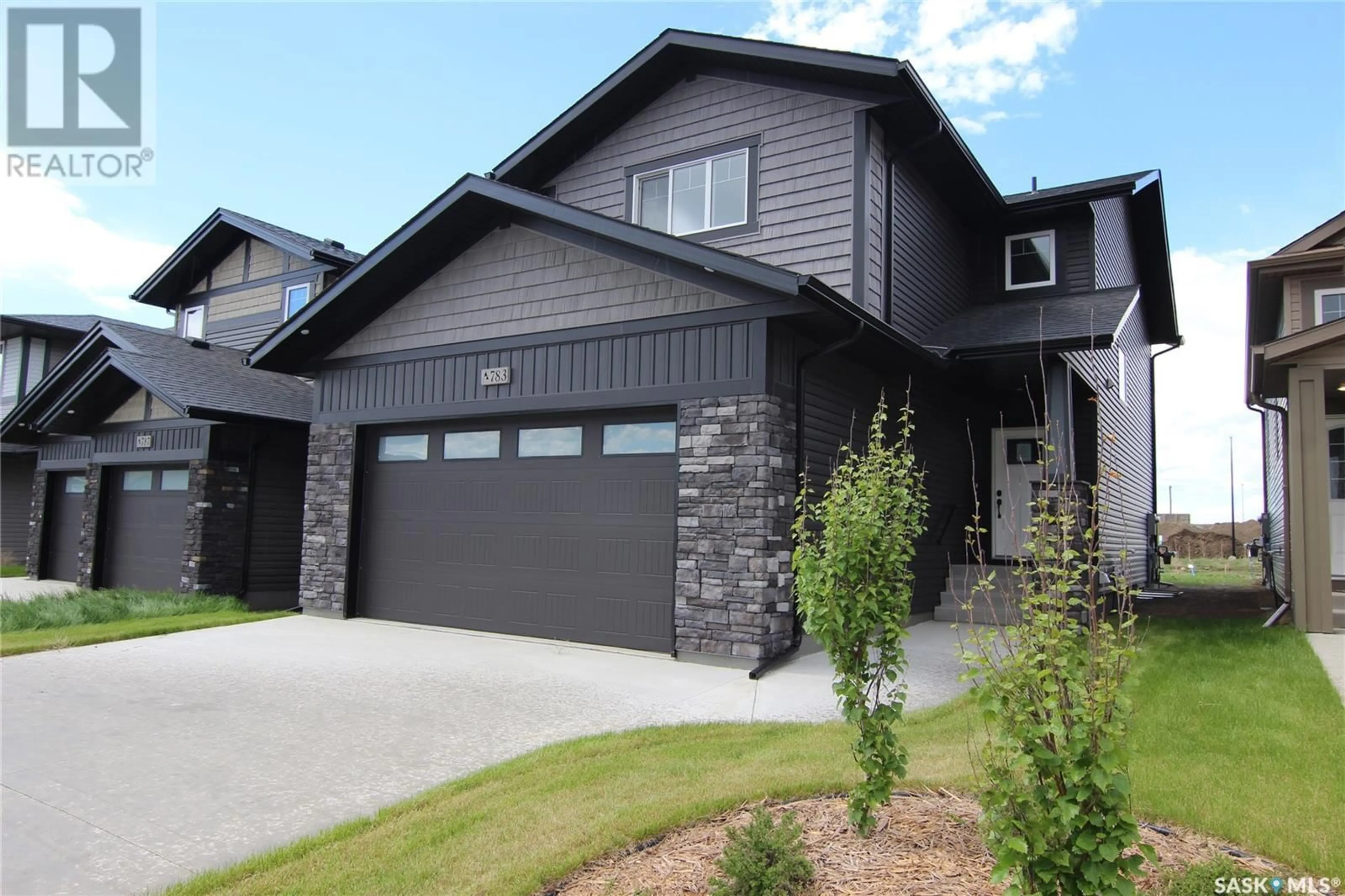 Home with vinyl exterior material, street for 106 KATZ AVENUE, Saskatoon Saskatchewan S7V1S9