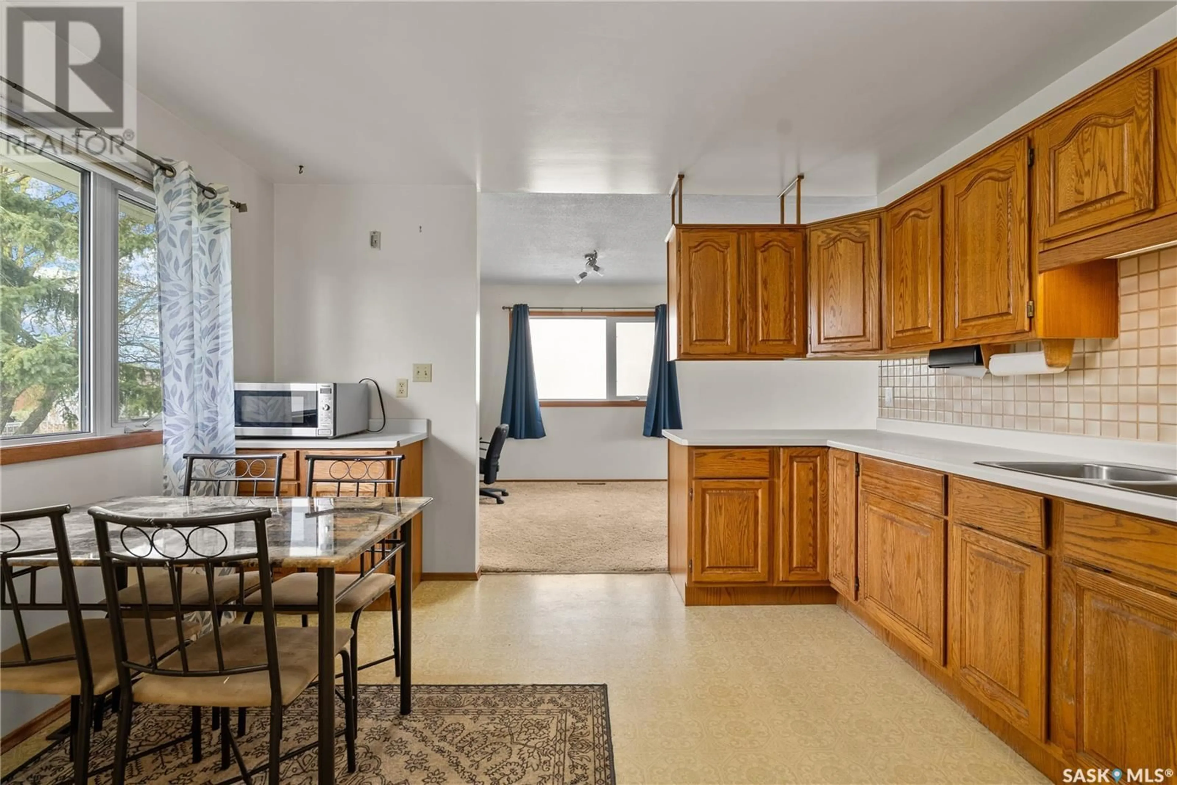 Standard kitchen, ceramic/tile floor for 404 6TH AVENUE, Biggar Saskatchewan S0K0M0