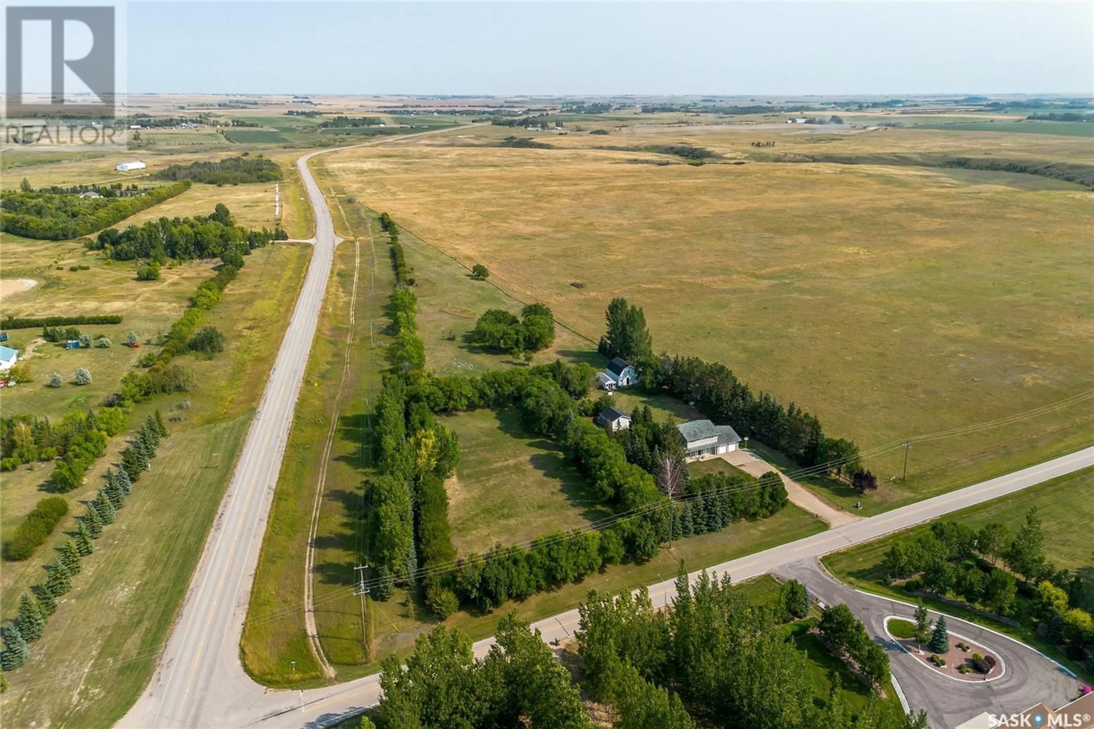 A pic from outside/outdoor area/front of a property/back of a property/a pic from drone, unknown for 1 KENNEDY ROAD, Edenwold Rm No. 158 Saskatchewan S4L5B1