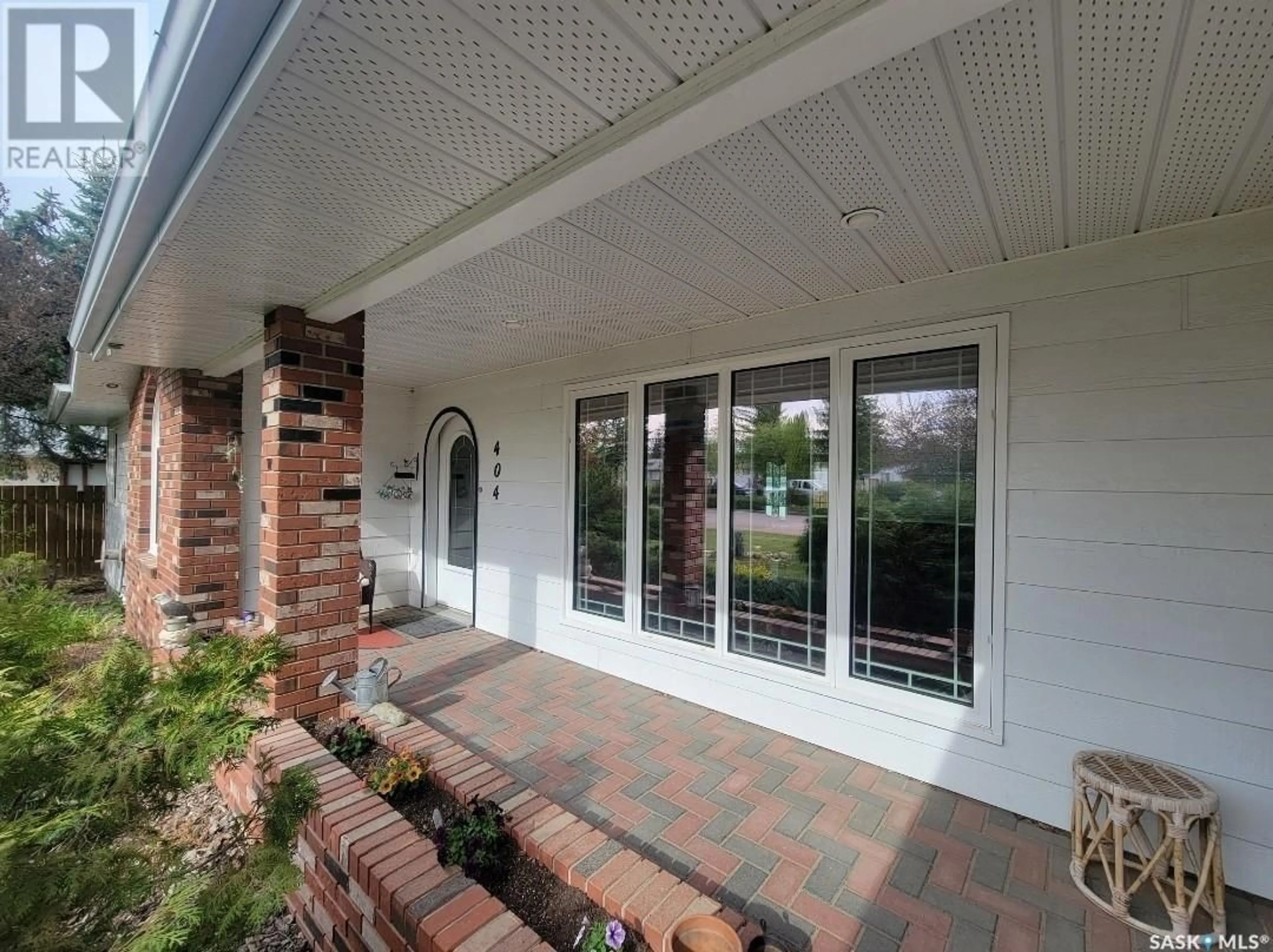 Home with brick exterior material, street for 404 BROAD STREET, Cut Knife Saskatchewan S0M0N0