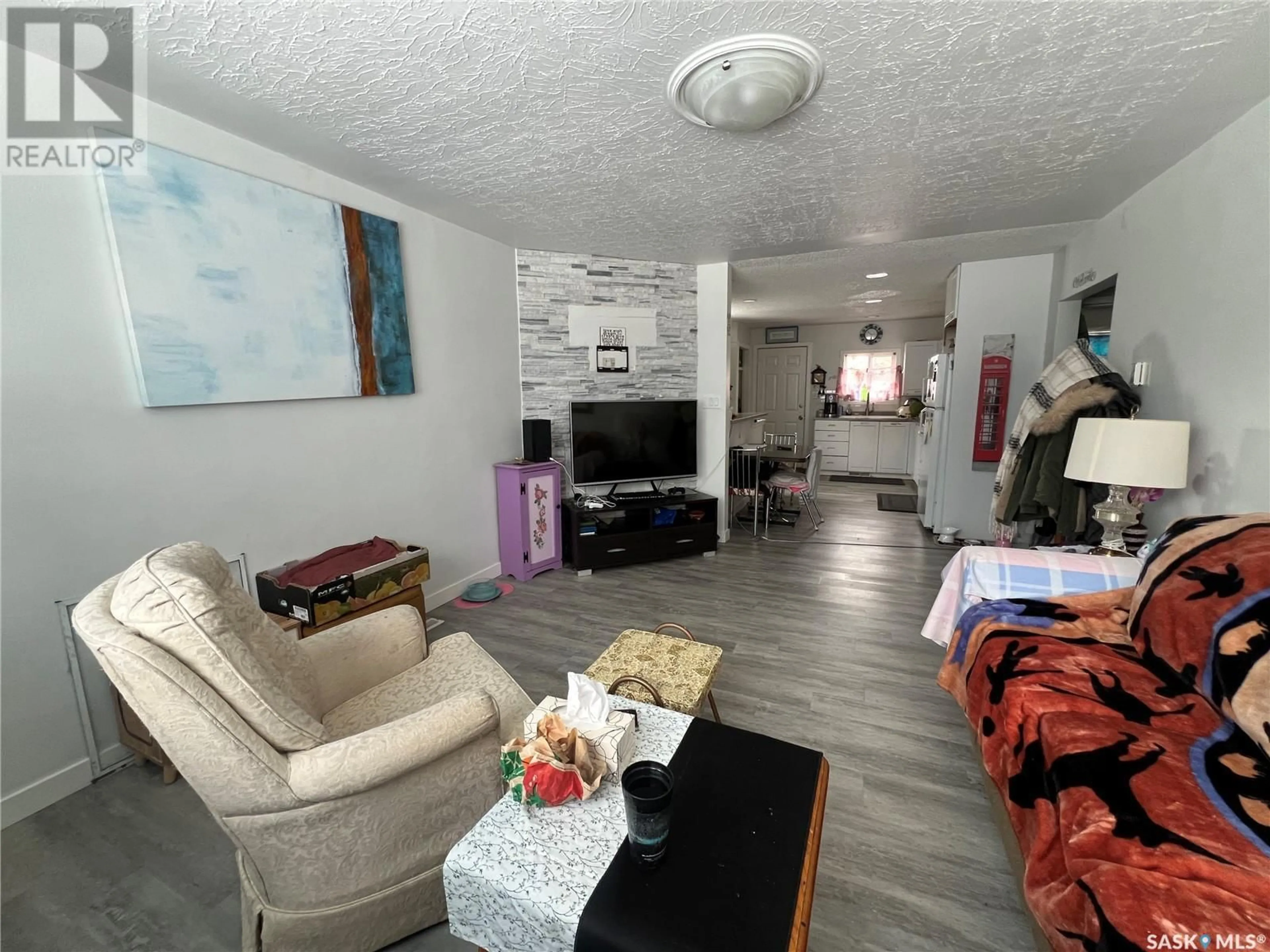 Living room with furniture, unknown for 225 OTTAWA AVENUE, Saskatoon Saskatchewan S7M3L4