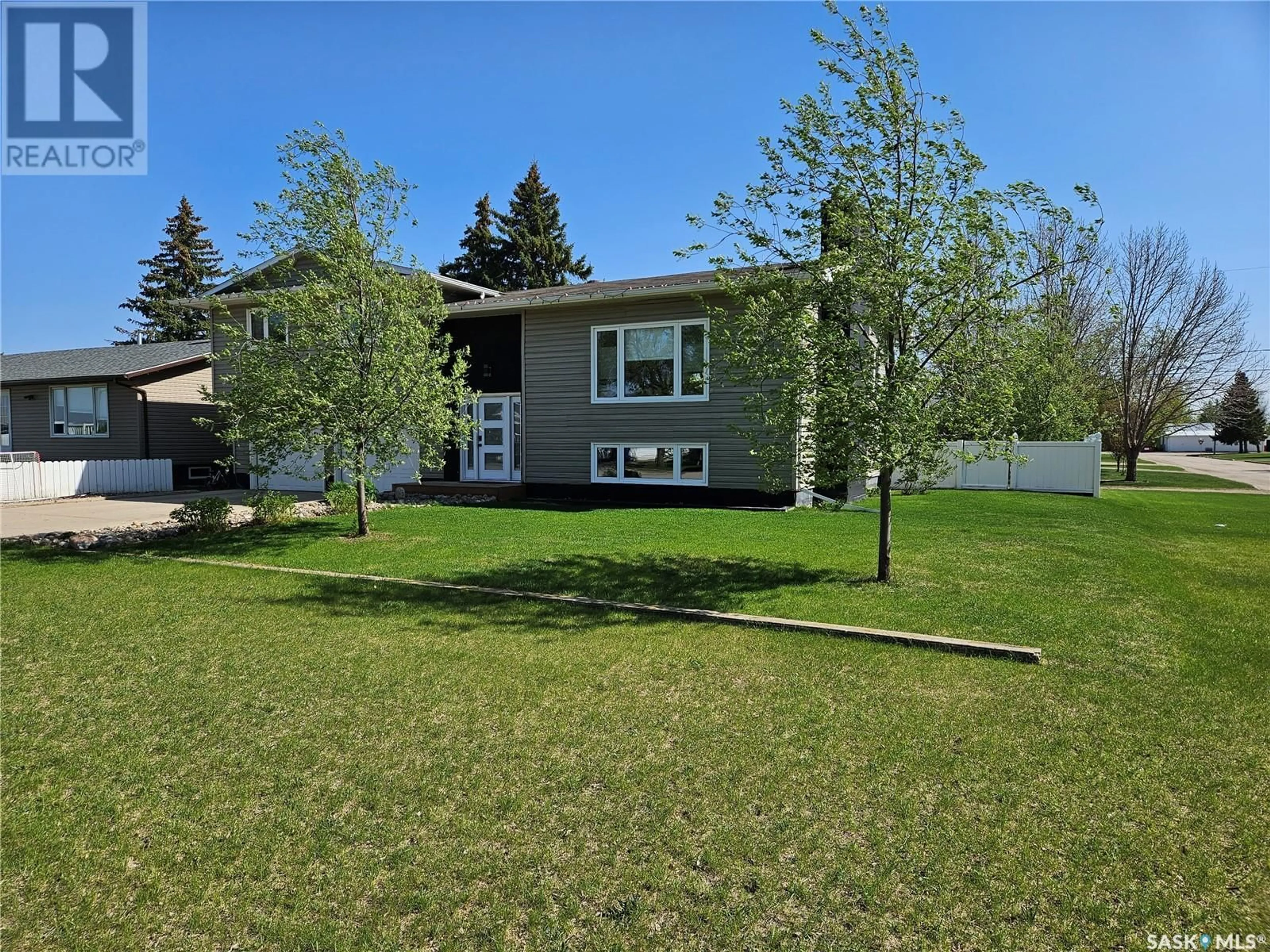 Home with vinyl exterior material, street for 5 SOURIS AVENUE, Redvers Saskatchewan S0C2H0