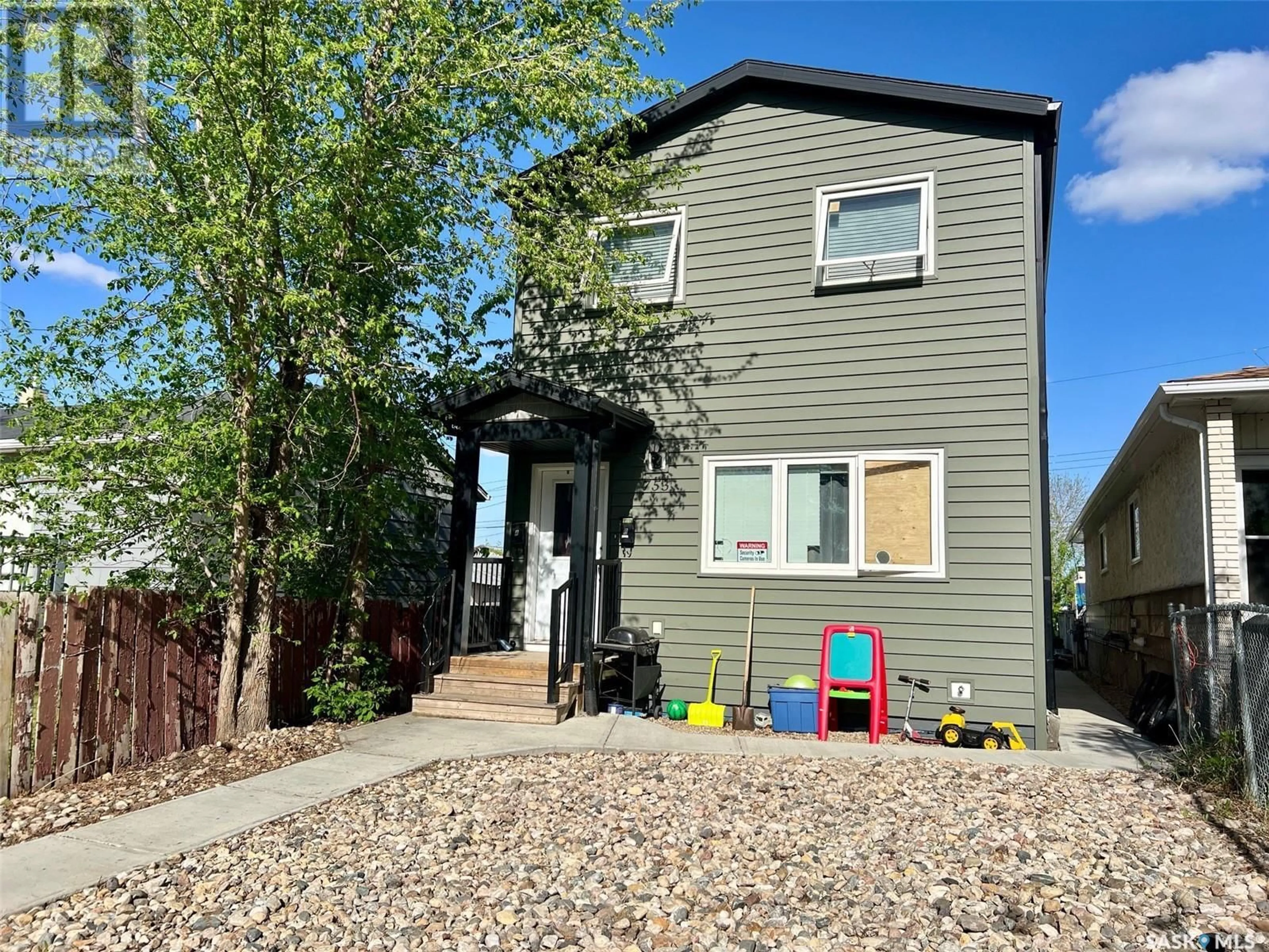 Home with vinyl exterior material, street for 753 RAE STREET, Regina Saskatchewan S4T2B1