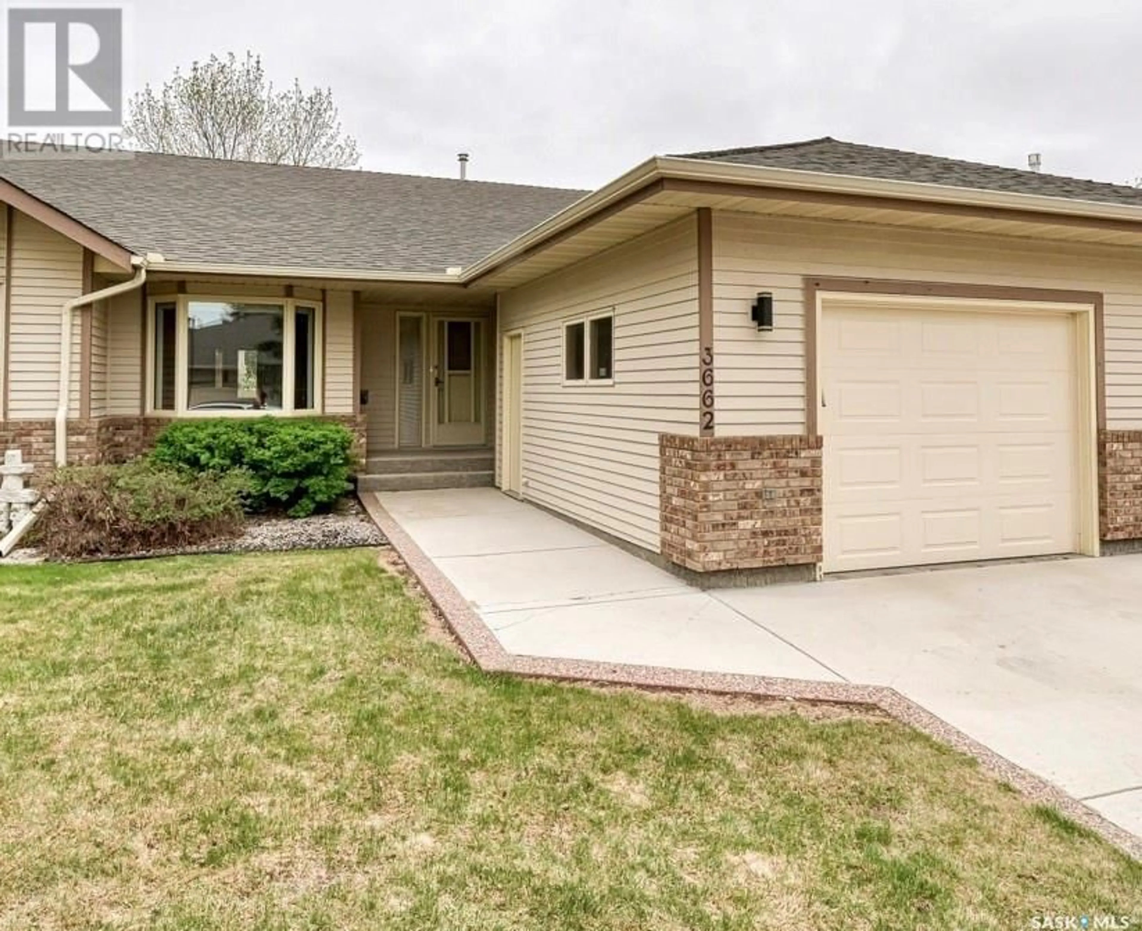 Home with brick exterior material, street for 3662 WEDGWOOD WAY, Regina Saskatchewan S4V2M7