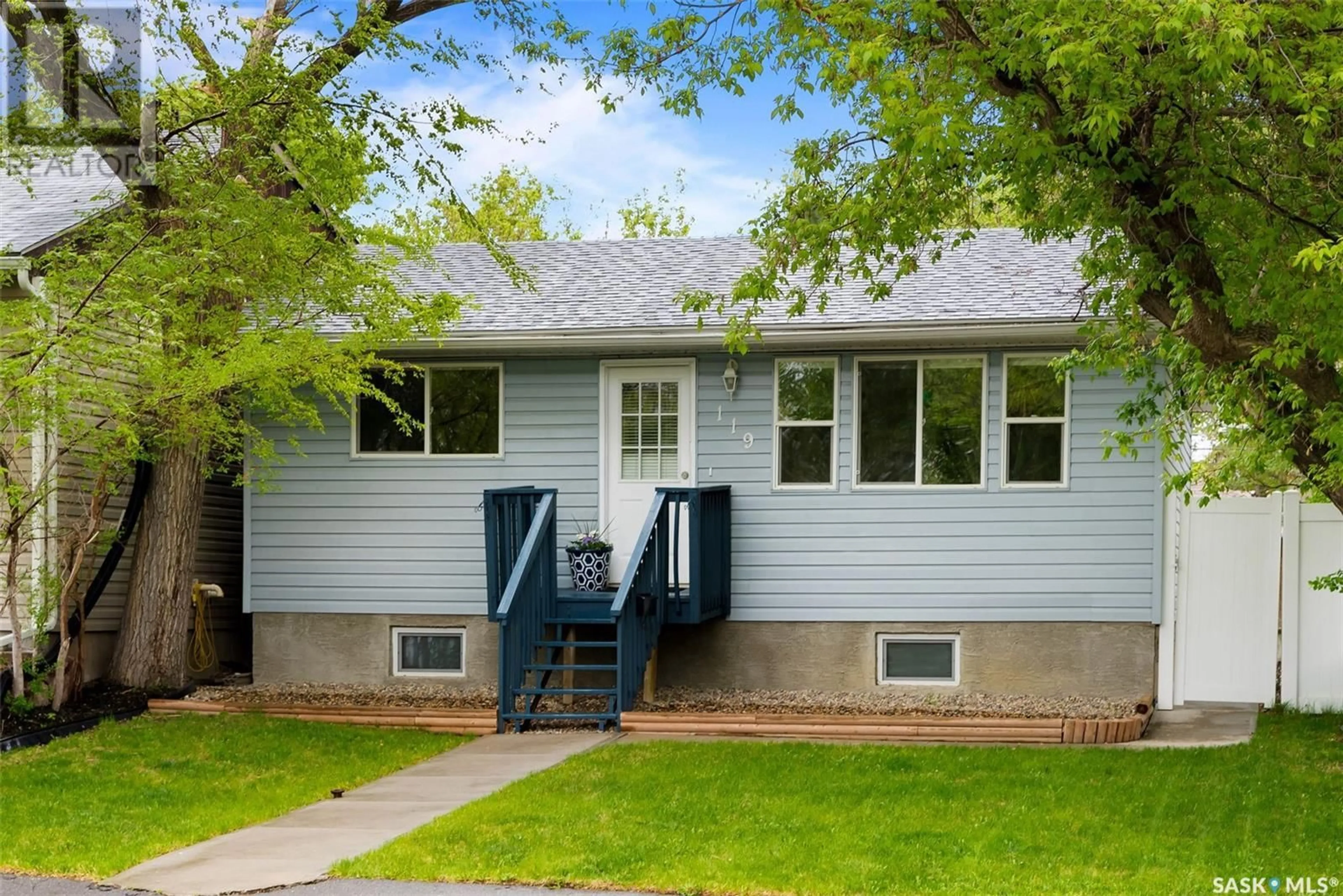 Home with vinyl exterior material, street for 119 OSLER STREET, Regina Saskatchewan S4R1V3