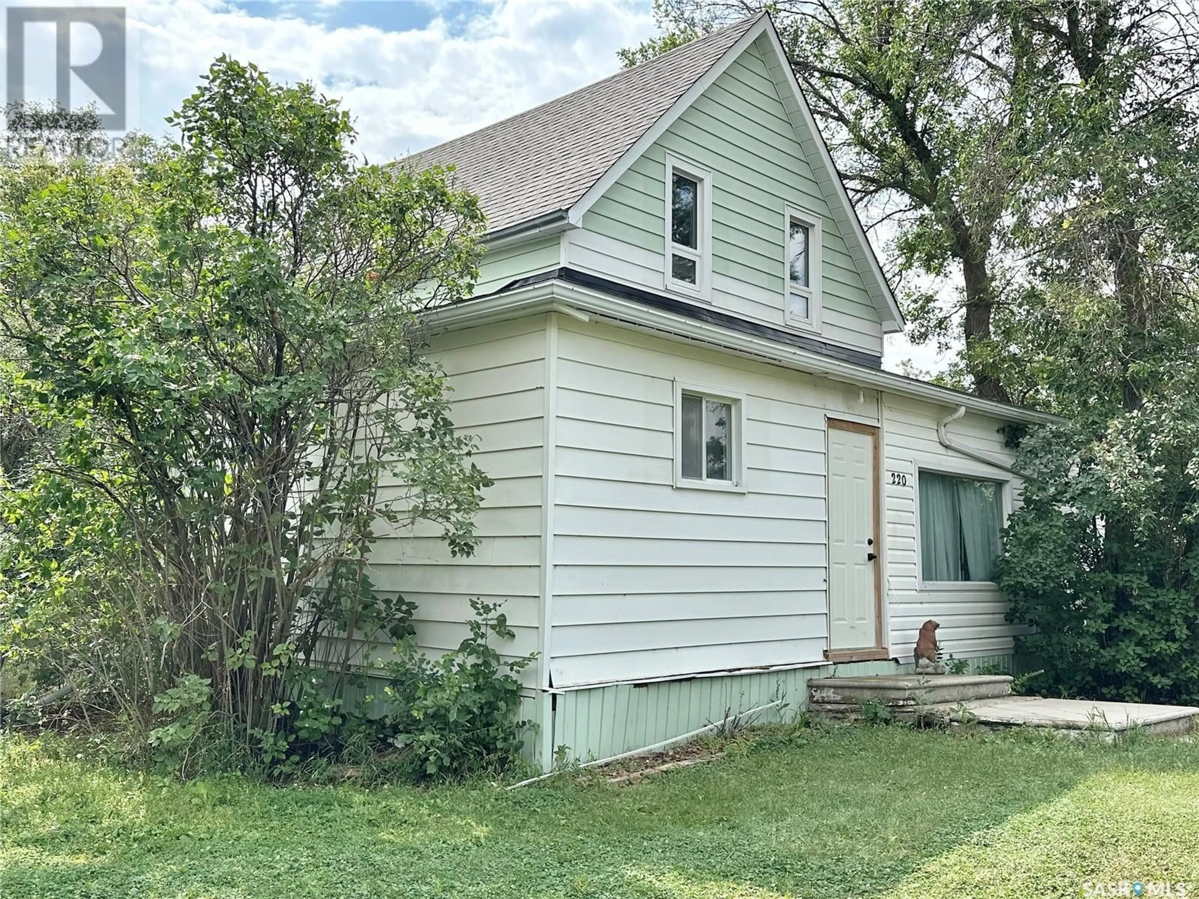 Home with vinyl exterior material, street for 220 SOURIS STREET, Milestone Saskatchewan S0G3L0
