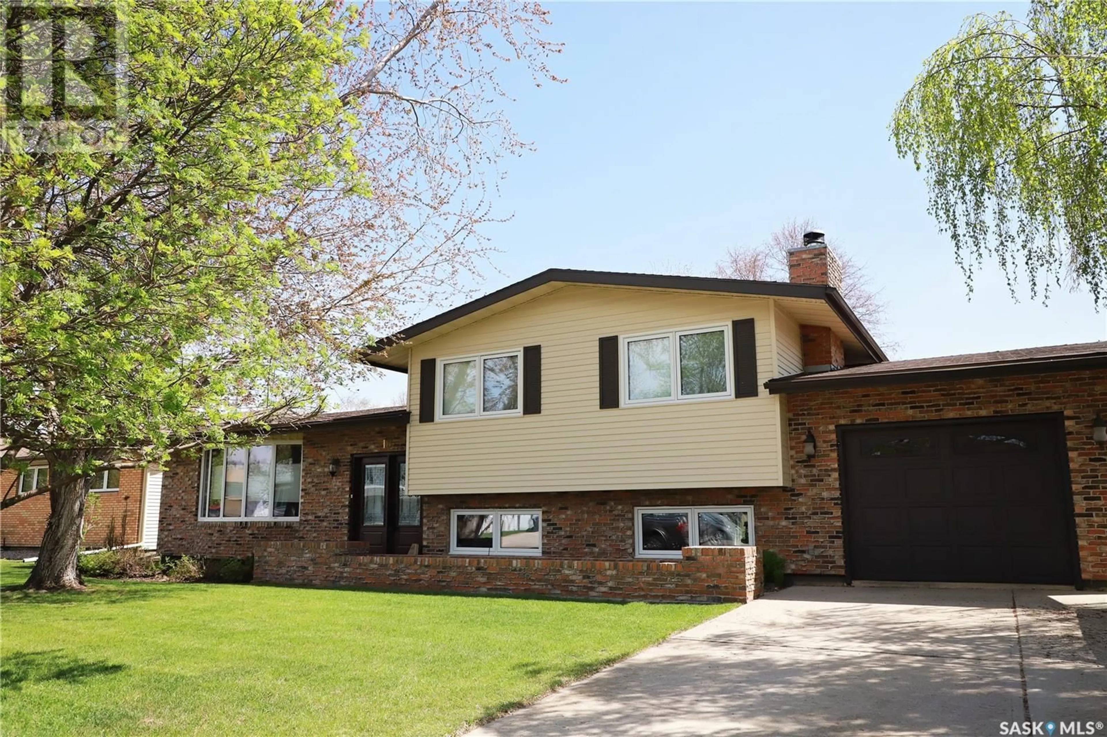 Home with brick exterior material, street for 18 VANIER DRIVE, Melville Saskatchewan S0A2P0