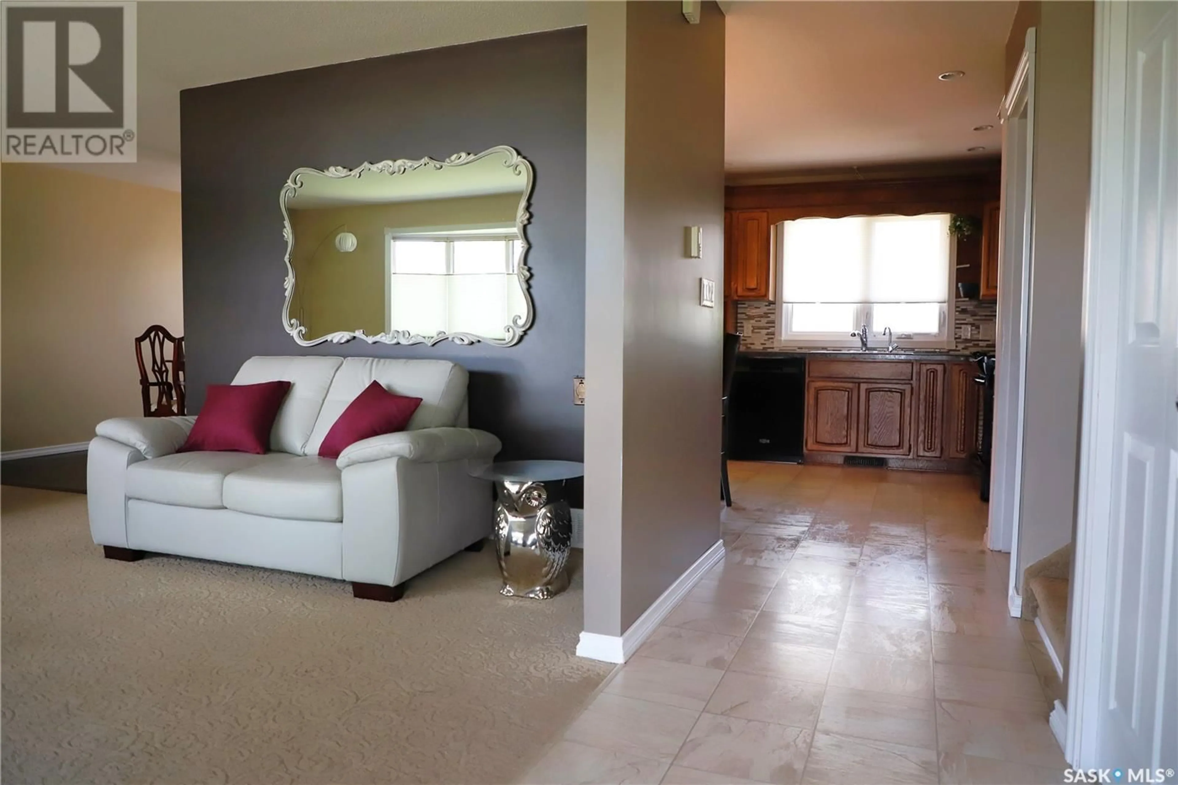 Living room with furniture, ceramic/tile floor for 18 VANIER DRIVE, Melville Saskatchewan S0A2P0