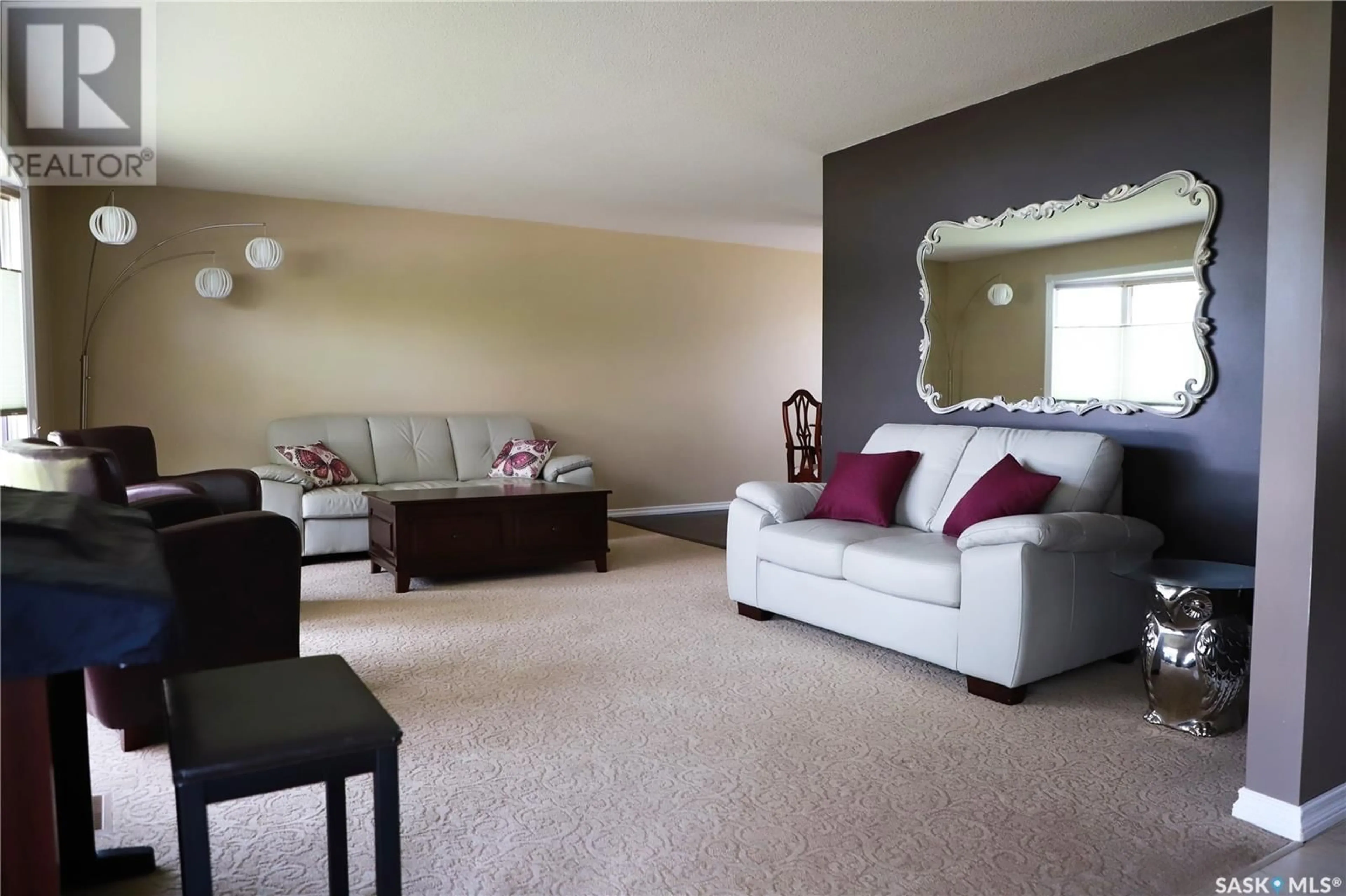 Living room with furniture, carpet floor for 18 VANIER DRIVE, Melville Saskatchewan S0A2P0