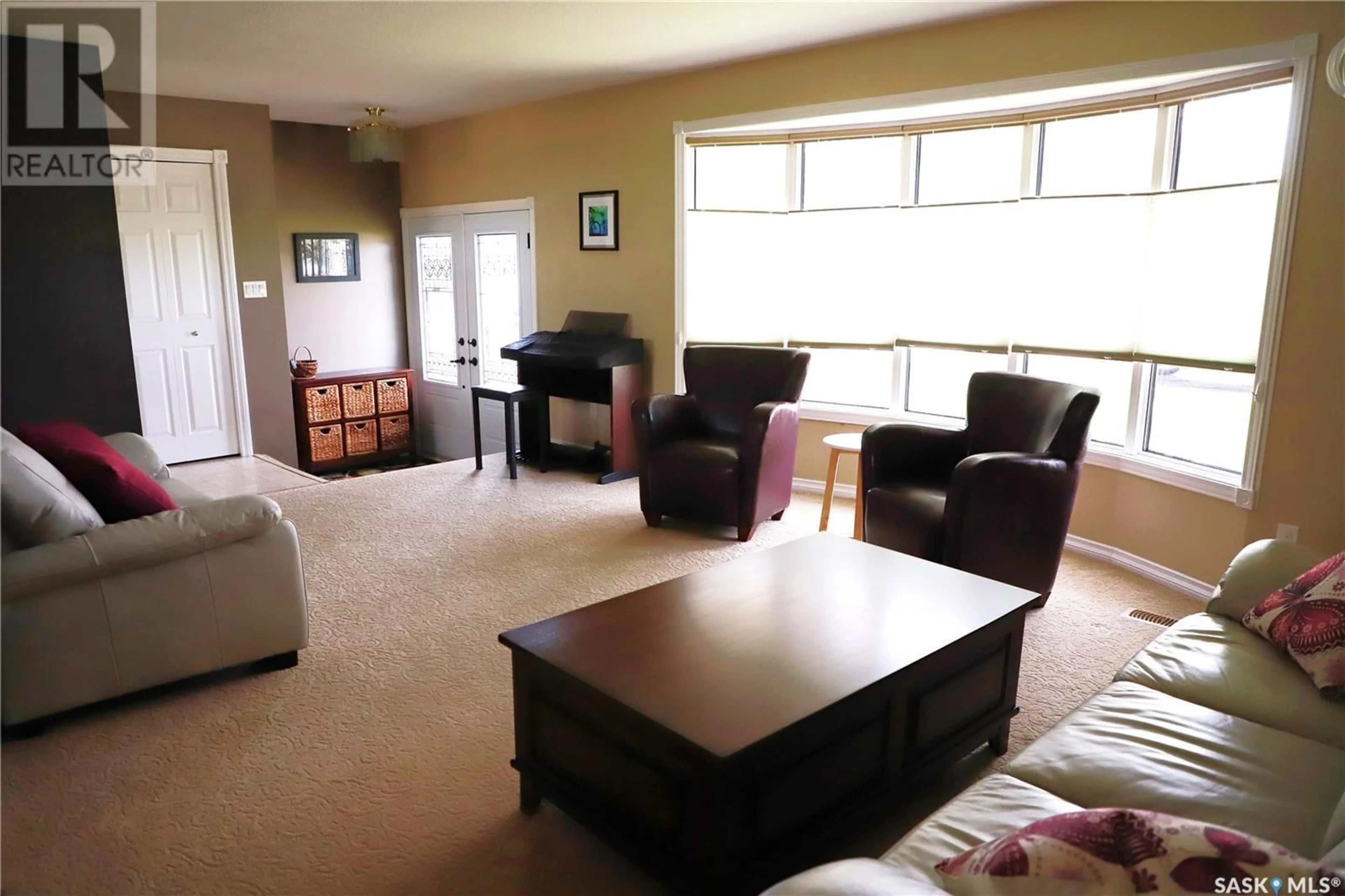 Living room with furniture, unknown for 18 VANIER DRIVE, Melville Saskatchewan S0A2P0