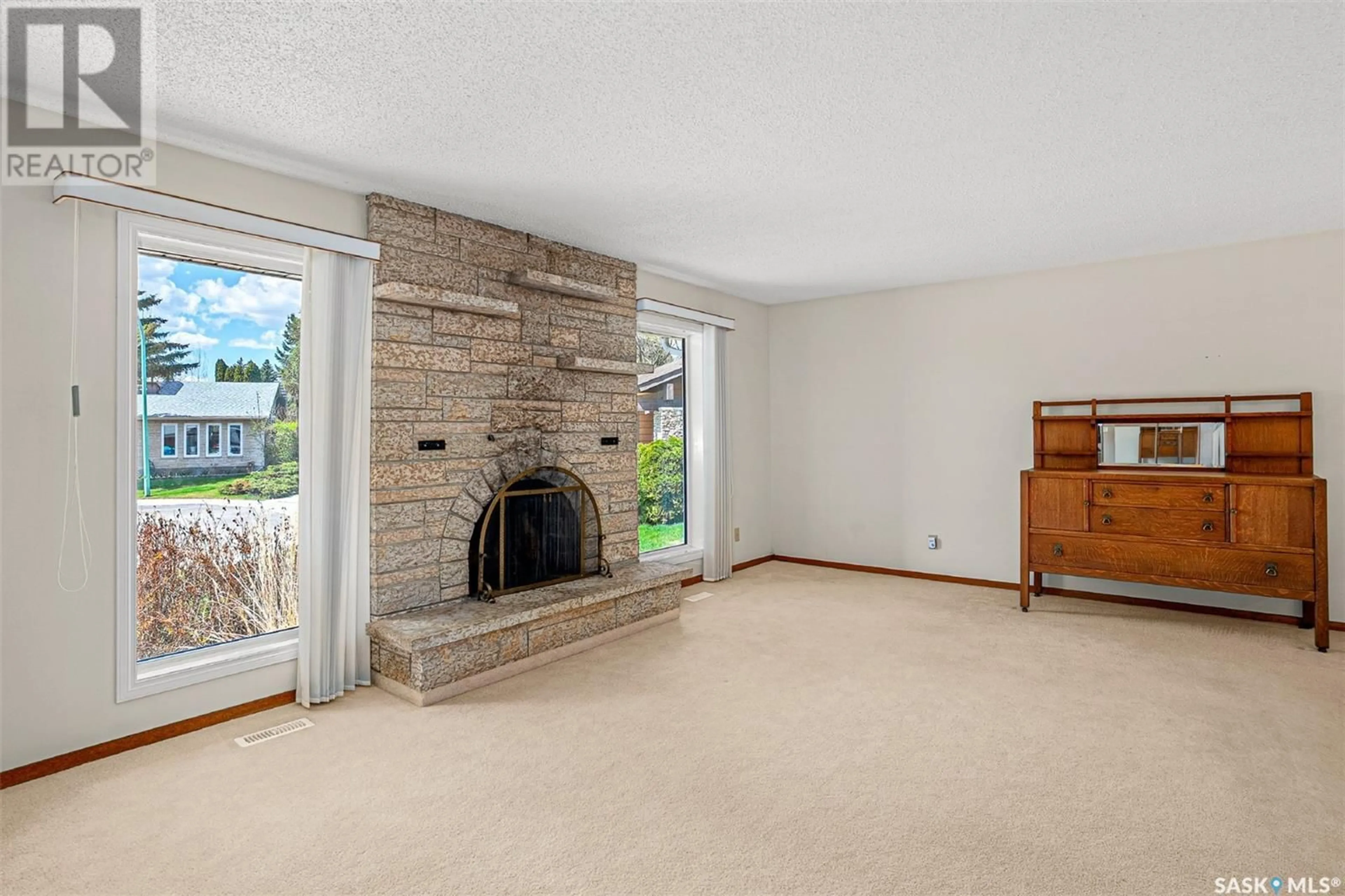 Living room with furniture, unknown for 207 COSTIGAN BAY, Saskatoon Saskatchewan S7J3P4