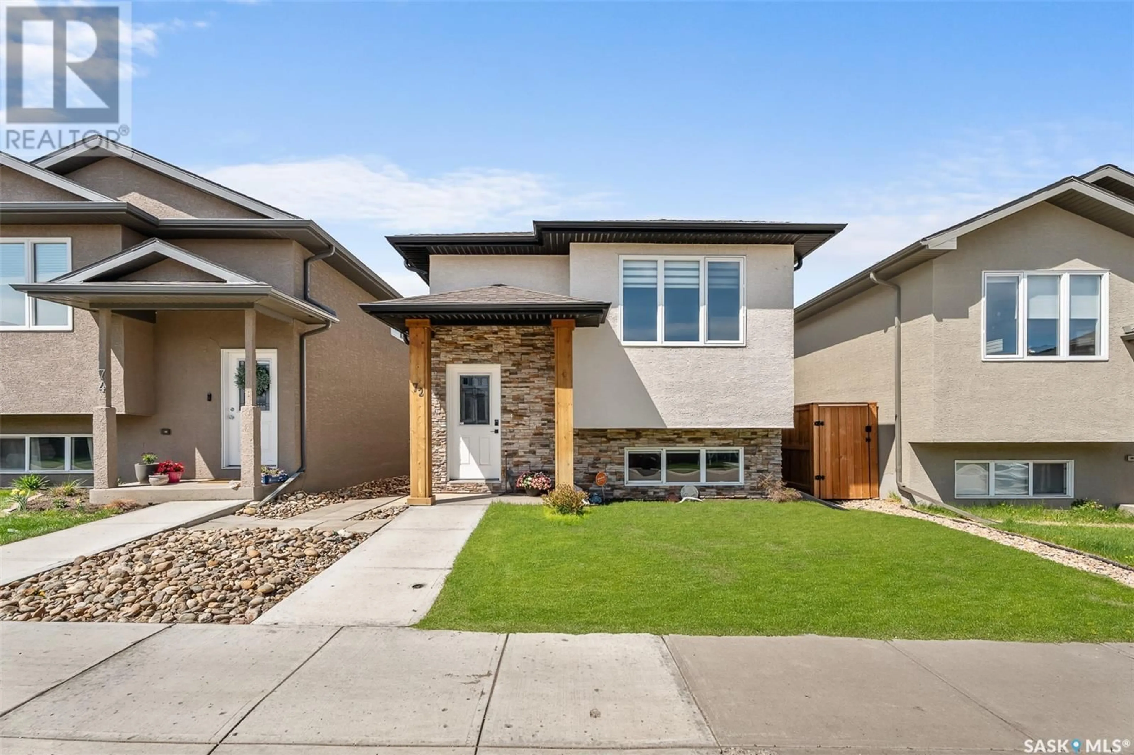 Home with vinyl exterior material, street for 72 BRIGHAM ROAD, Moose Jaw Saskatchewan S6K0A7