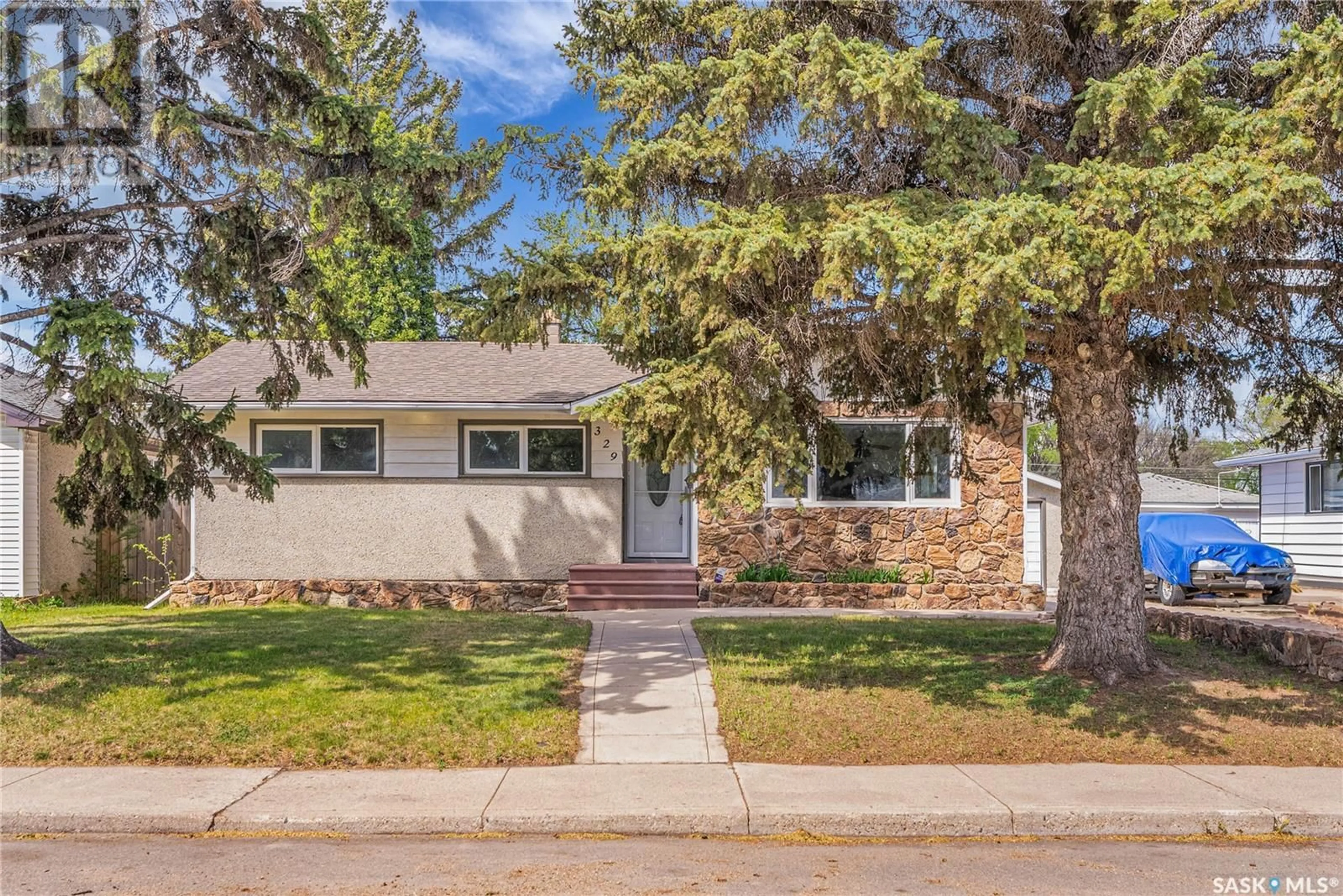 Home with brick exterior material, street for 329 Y AVENUE, Saskatoon Saskatchewan S7L3K8