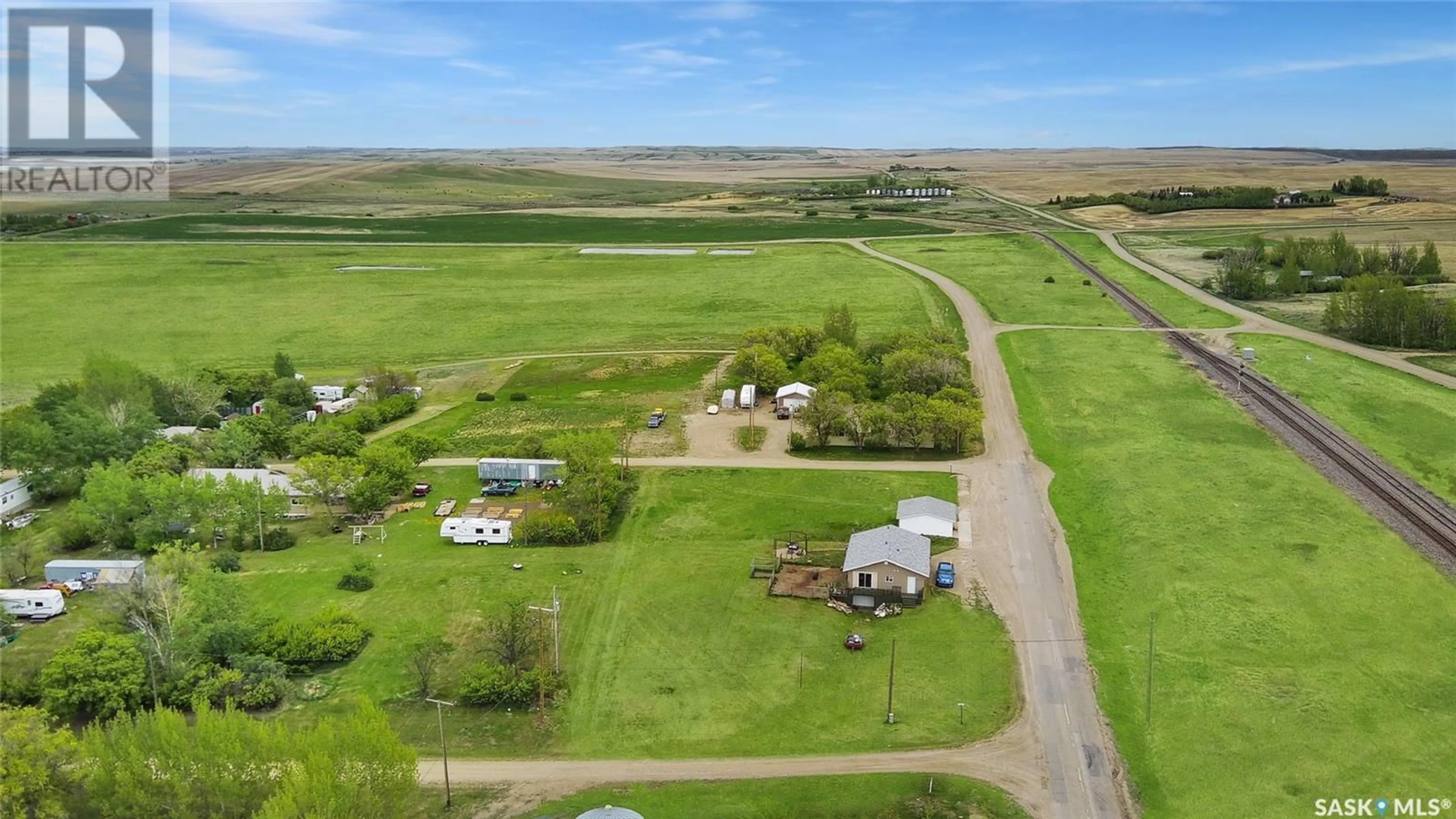A pic from outside/outdoor area/front of a property/back of a property/a pic from drone, water/lake/river/ocean view for 800 RAILWAY AVENUE, Webb Saskatchewan S0N2X0