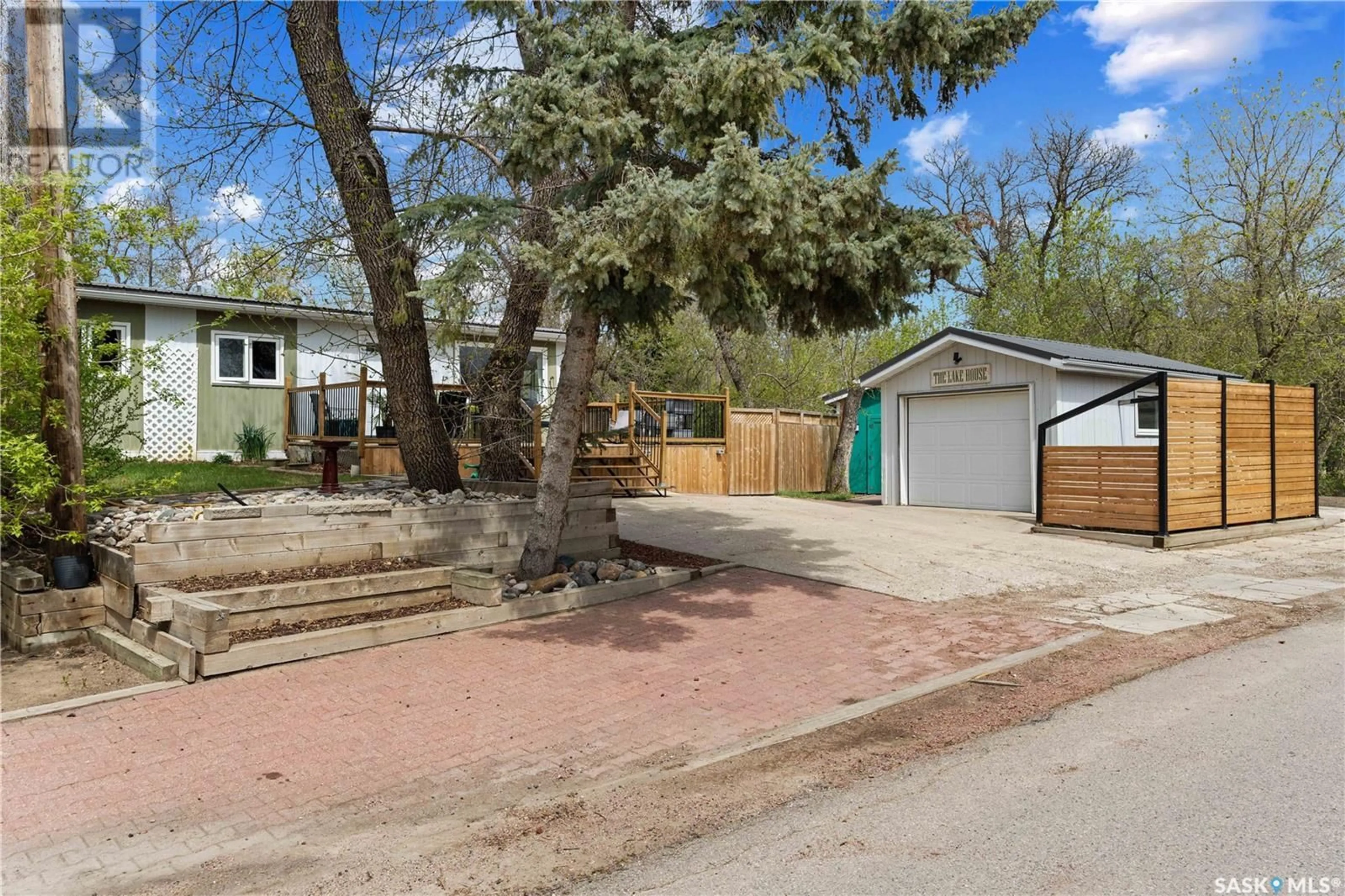 A pic from outside/outdoor area/front of a property/back of a property/a pic from drone, street for 42 REGINA AVENUE, Katepwa Beach Saskatchewan S0G2Y0