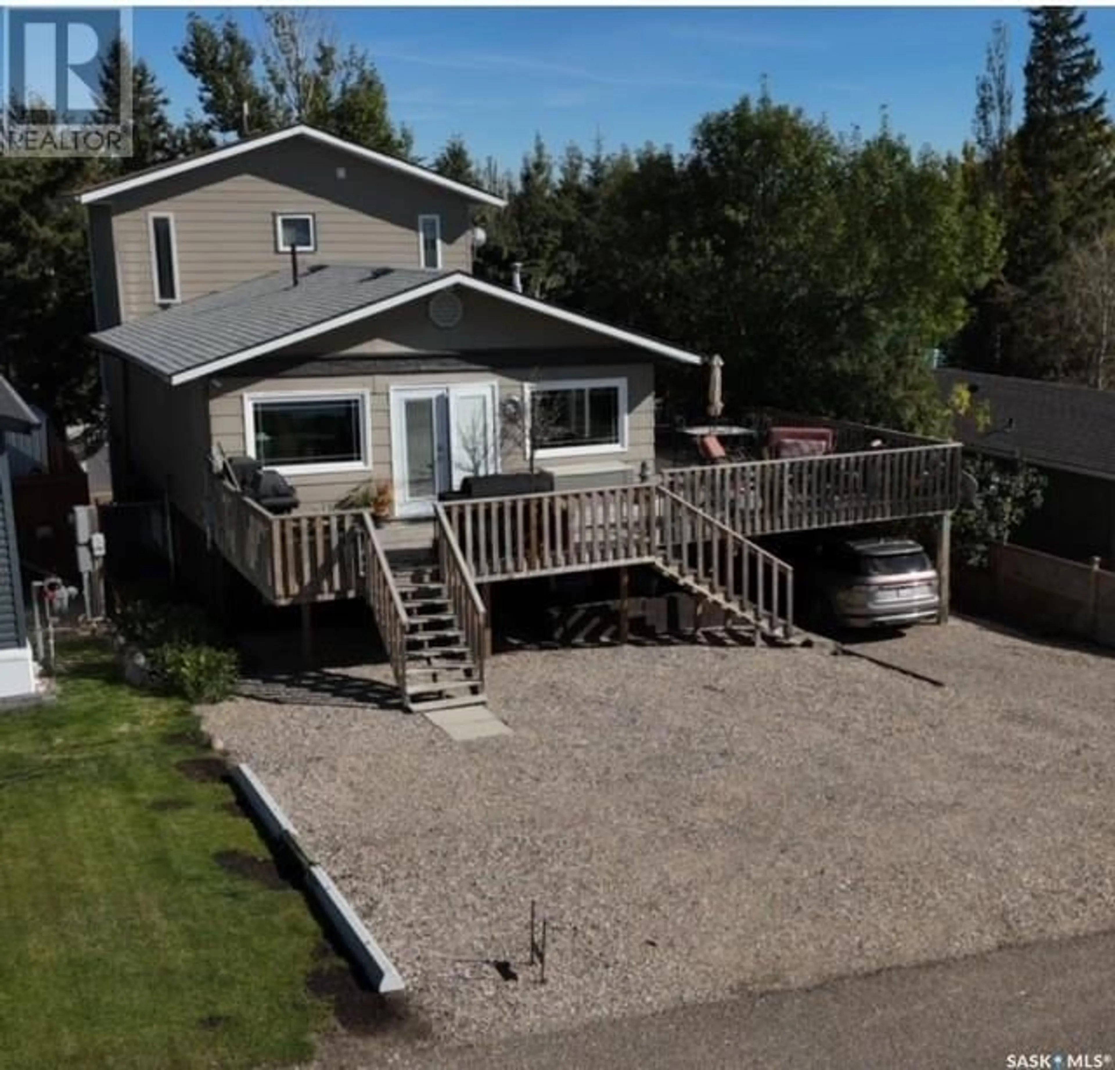A pic from outside/outdoor area/front of a property/back of a property/a pic from drone, water/lake/river/ocean view for 24 HIGHLAND AVENUE, Jackfish Lake Saskatchewan S0M0L0