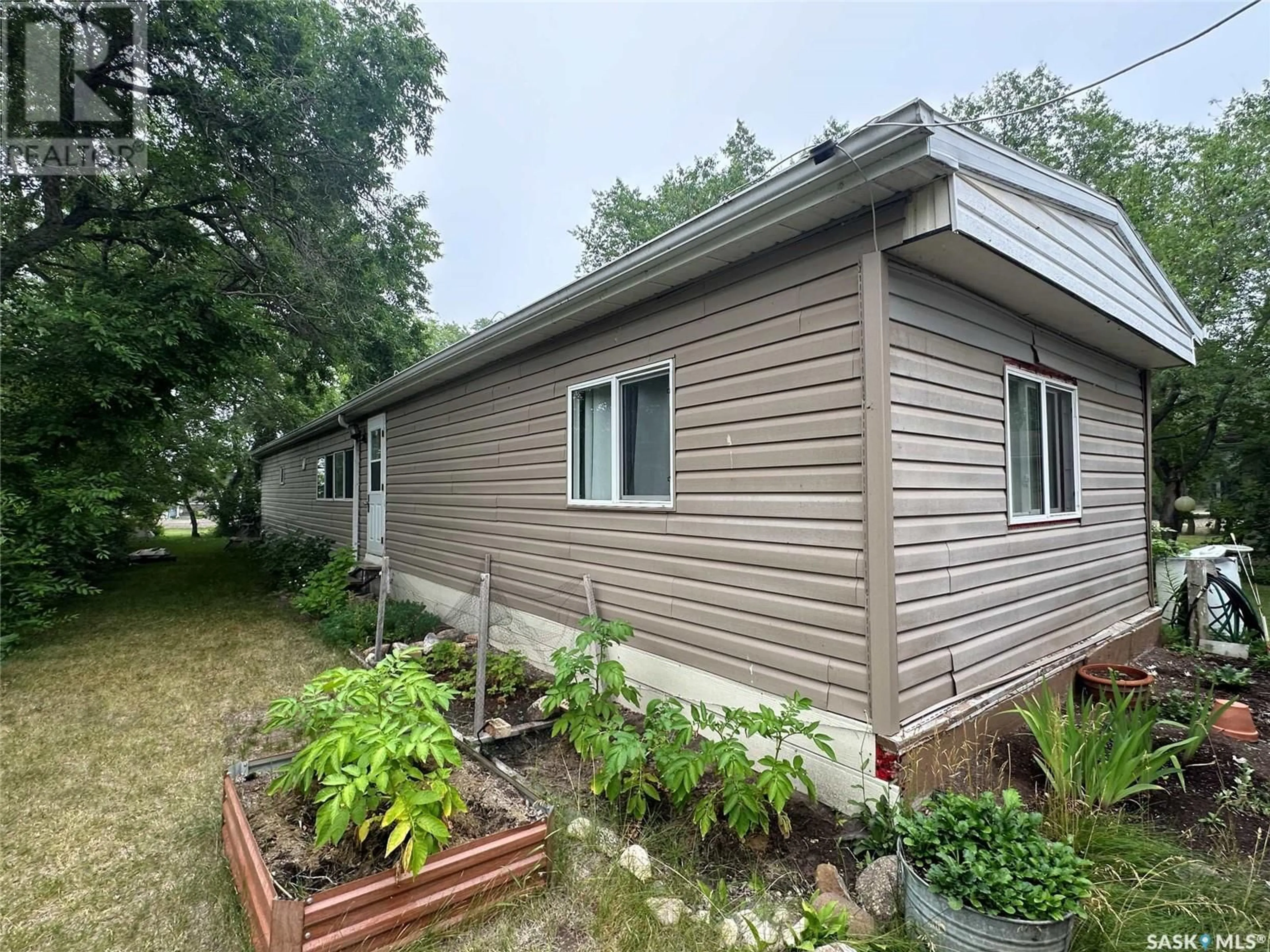 Home with vinyl exterior material, unknown for 63 DONALD PLACE, Alice Beach Saskatchewan S0G1C0