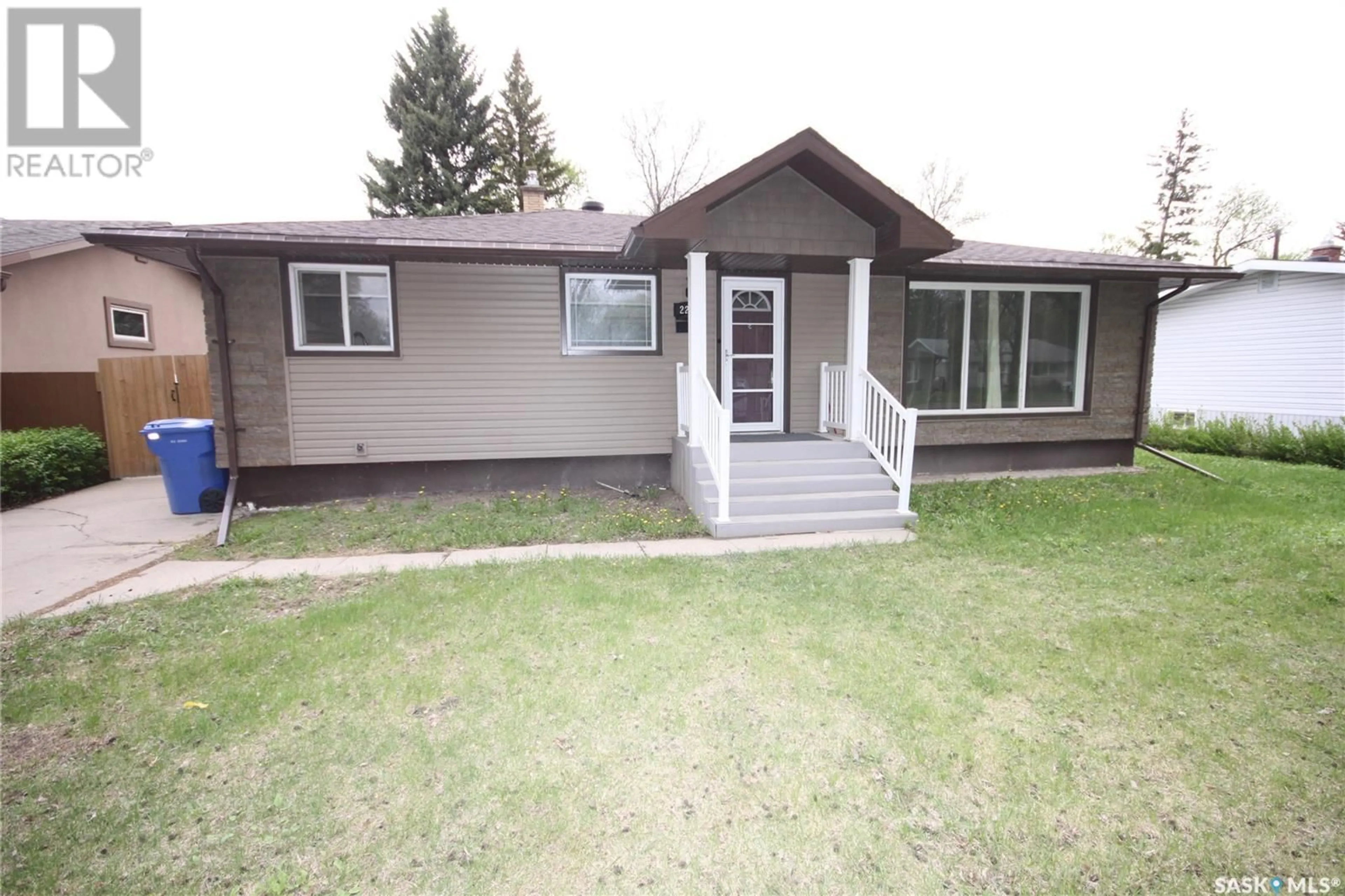 Home with vinyl exterior material, street for 2212 GRANT ROAD, Regina Saskatchewan S4S5E2