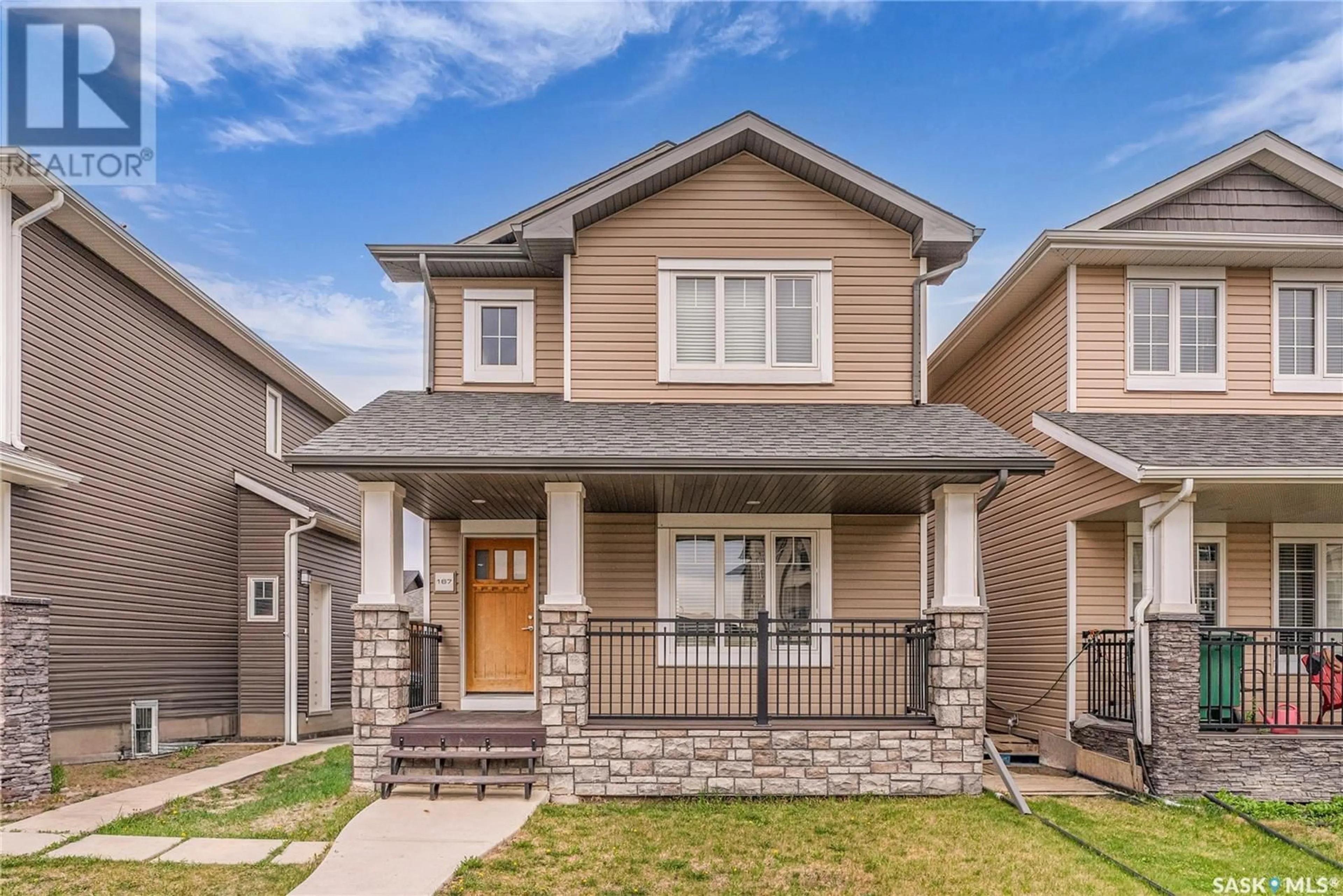Home with brick exterior material, street for 167 TWEED LANE, Saskatoon Saskatchewan S7V0K1