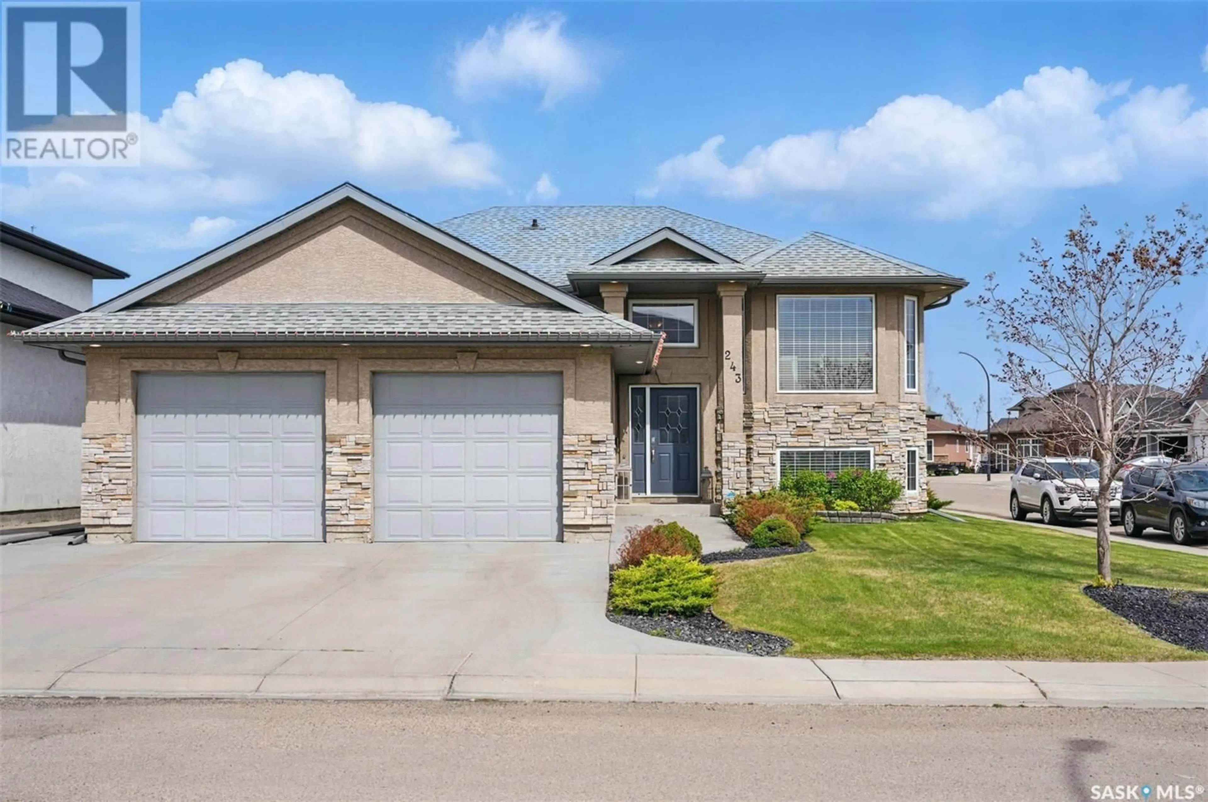 Home with brick exterior material, street for 243 WATERS LANE, Saskatoon Saskatchewan S7W0A6