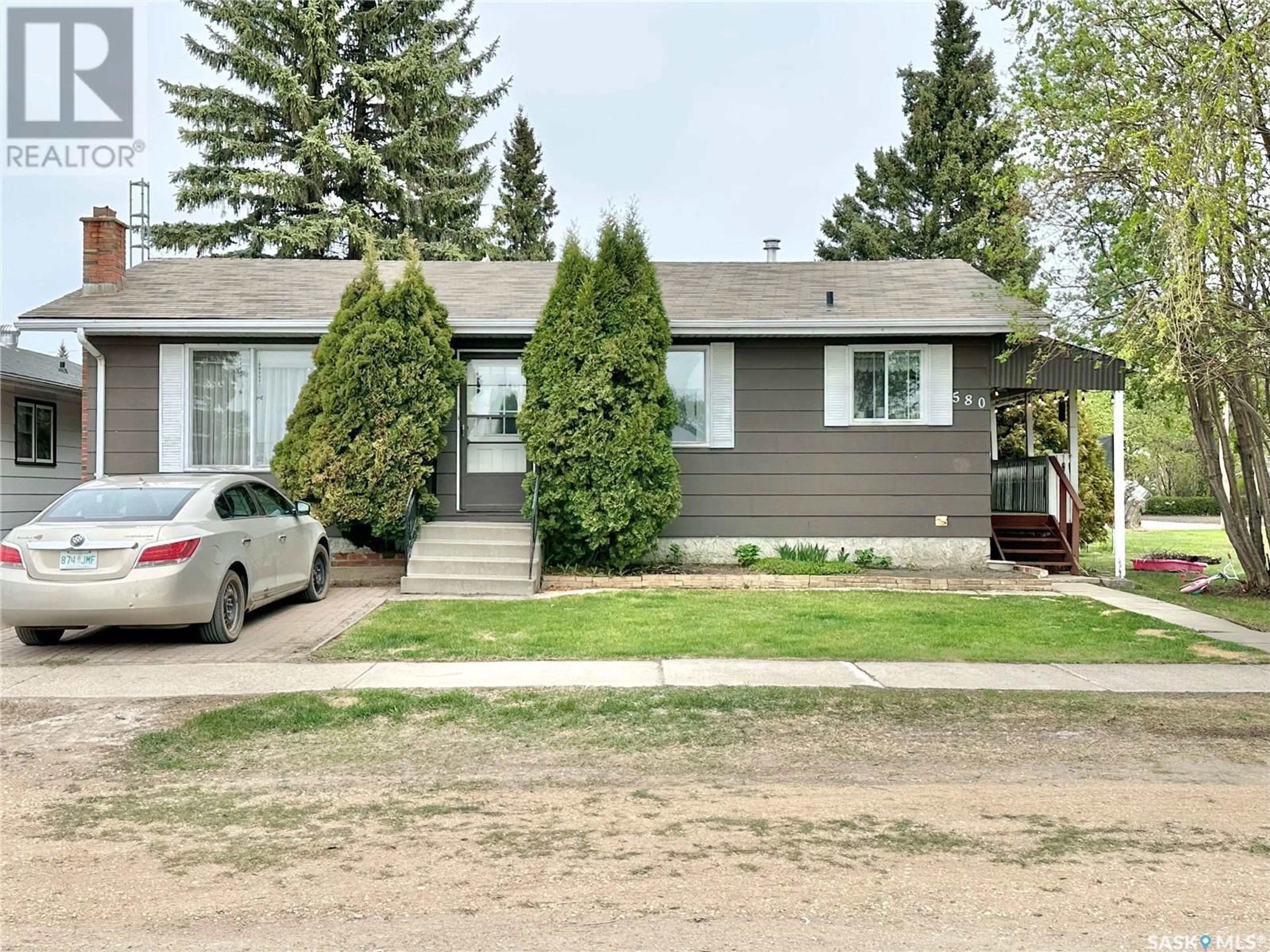 Home with vinyl exterior material, street for 580 1ST AVENUE, Canwood Saskatchewan S0J0K0