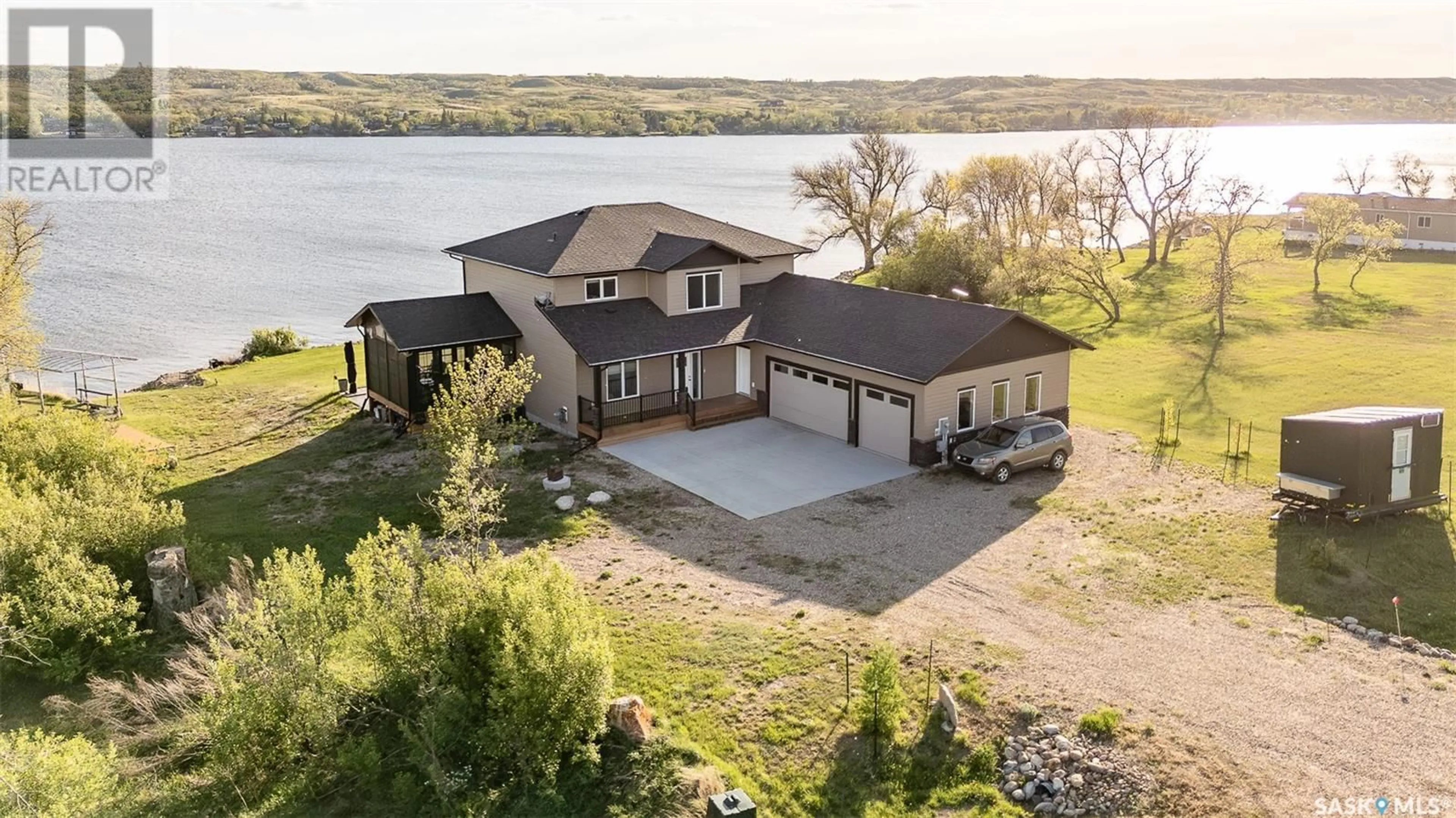 A pic from outside/outdoor area/front of a property/back of a property/a pic from drone, water/lake/river/ocean view for 823 DANIEL DRIVE, Marquis Rm No. 191 Saskatchewan S0G0A2