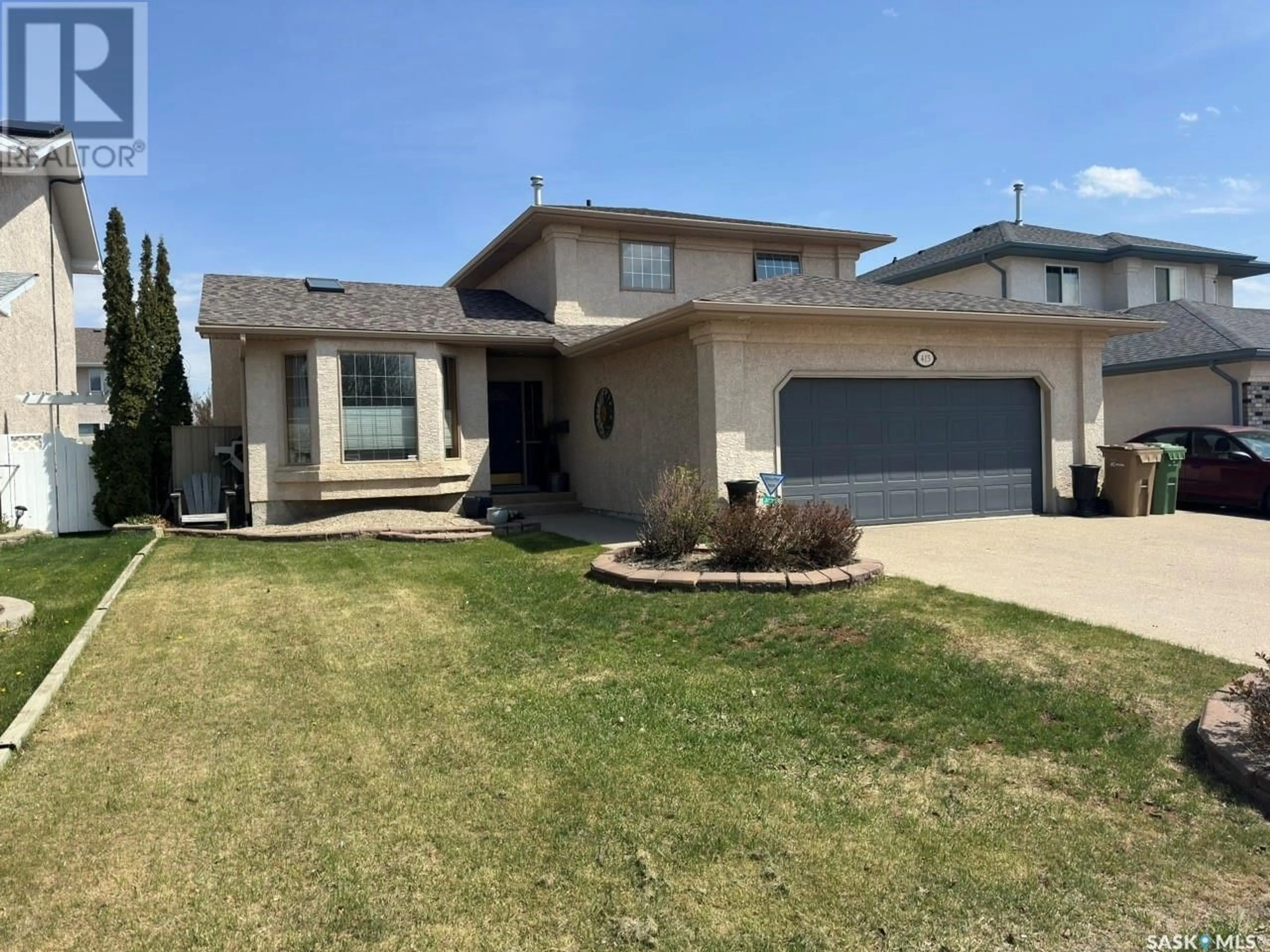 Home with vinyl exterior material, street for 415 FAIRWAY ROAD, Regina Saskatchewan S4Y1A1
