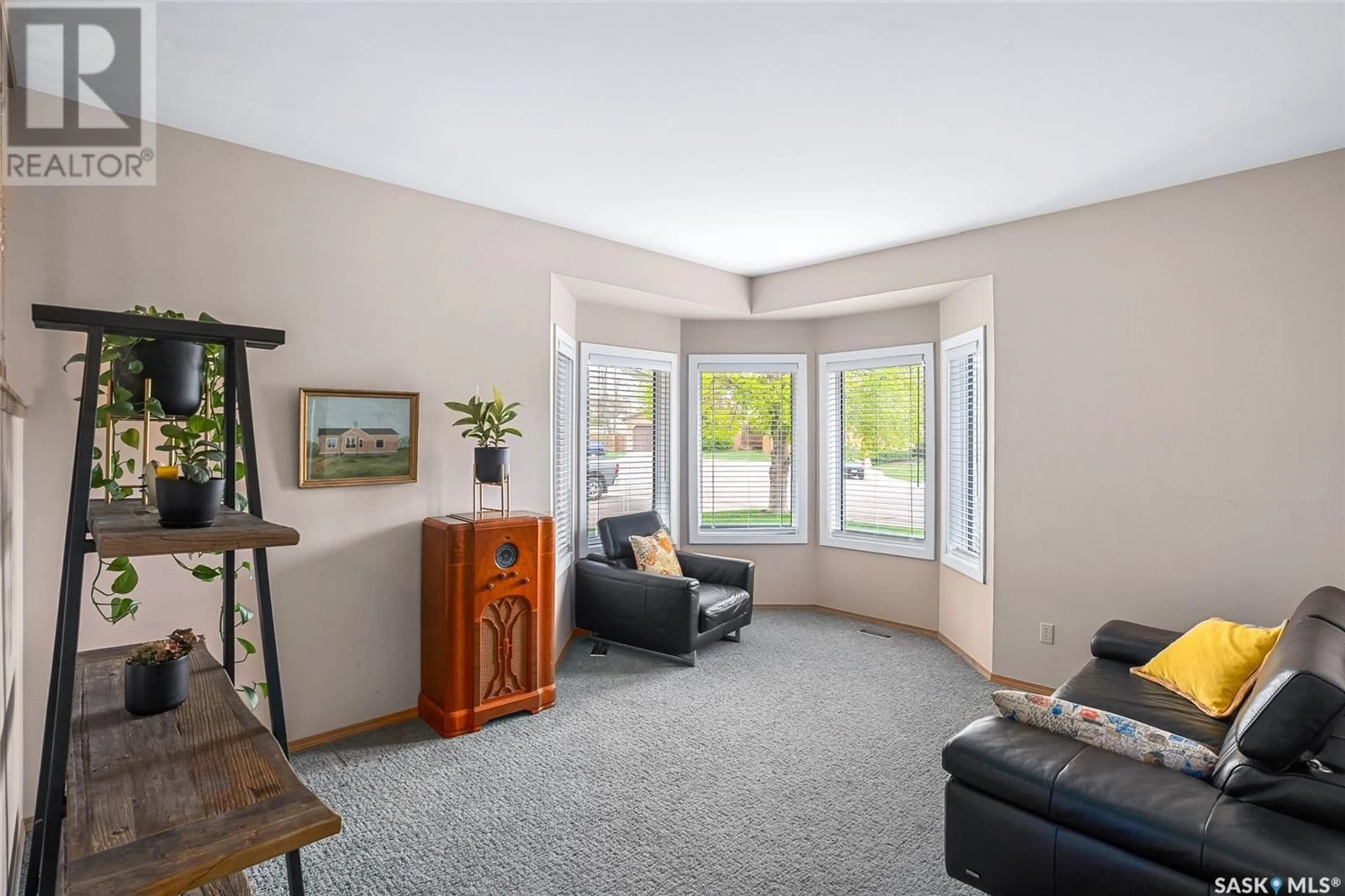 Living room with furniture, unknown for 211 NESSLIN TERRACE, Saskatoon Saskatchewan S7J4S2