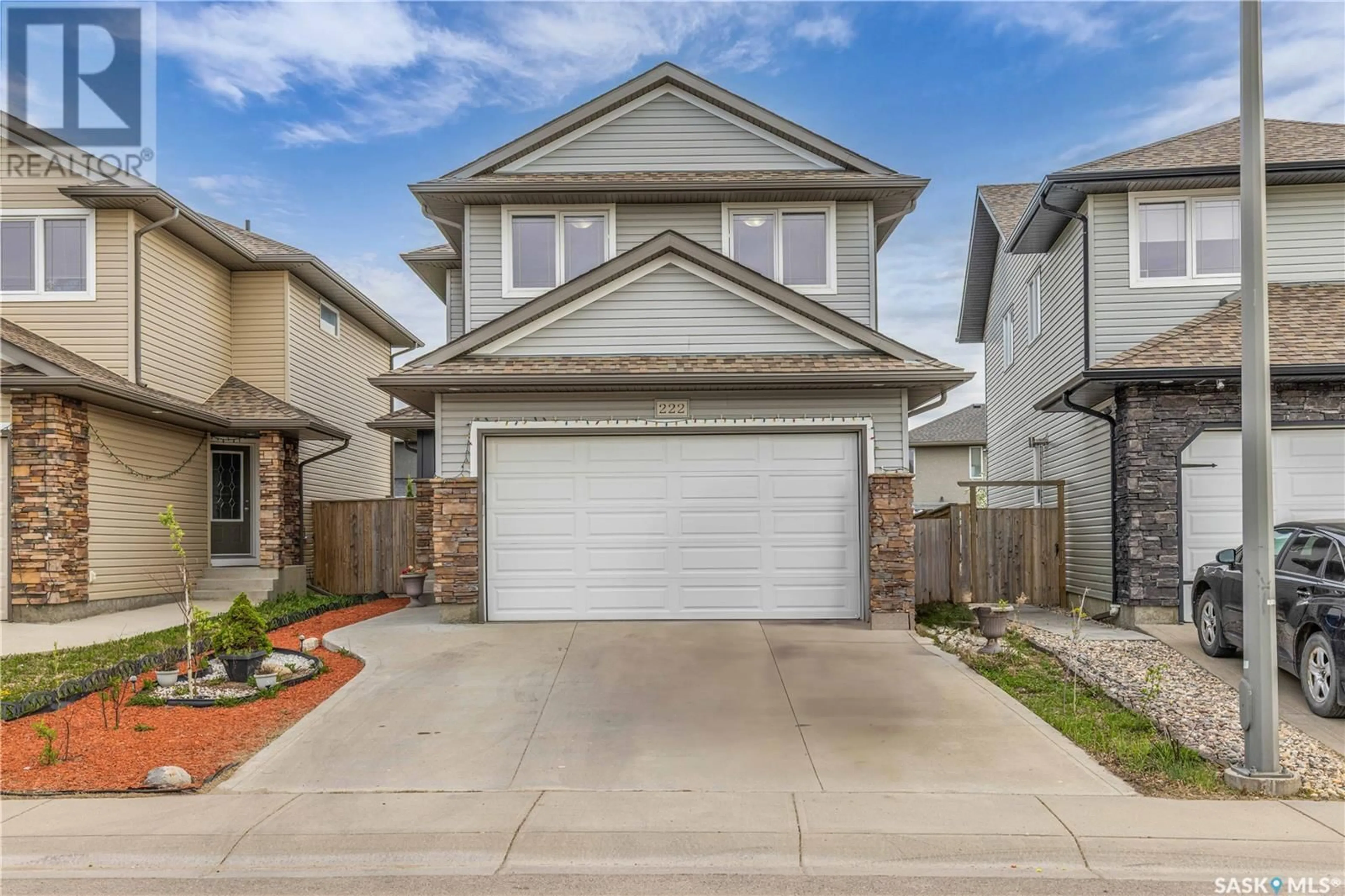 Home with vinyl exterior material, street for 222 ASHWORTH CRESCENT, Saskatoon Saskatchewan S7T0E6