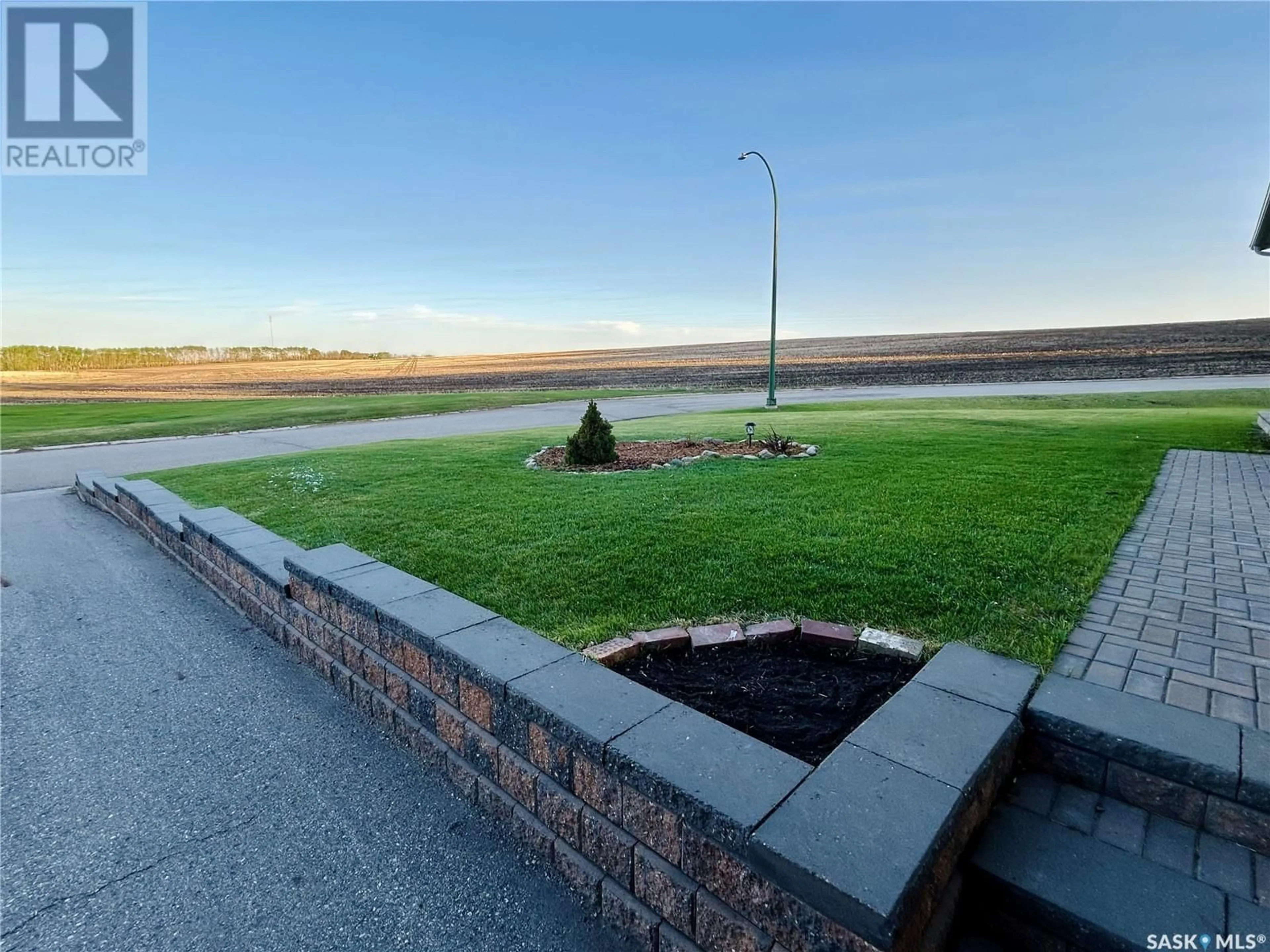 A pic from outside/outdoor area/front of a property/back of a property/a pic from drone, water/lake/river/ocean view for 507 1ST STREET, Kelvington Saskatchewan S0A1W0
