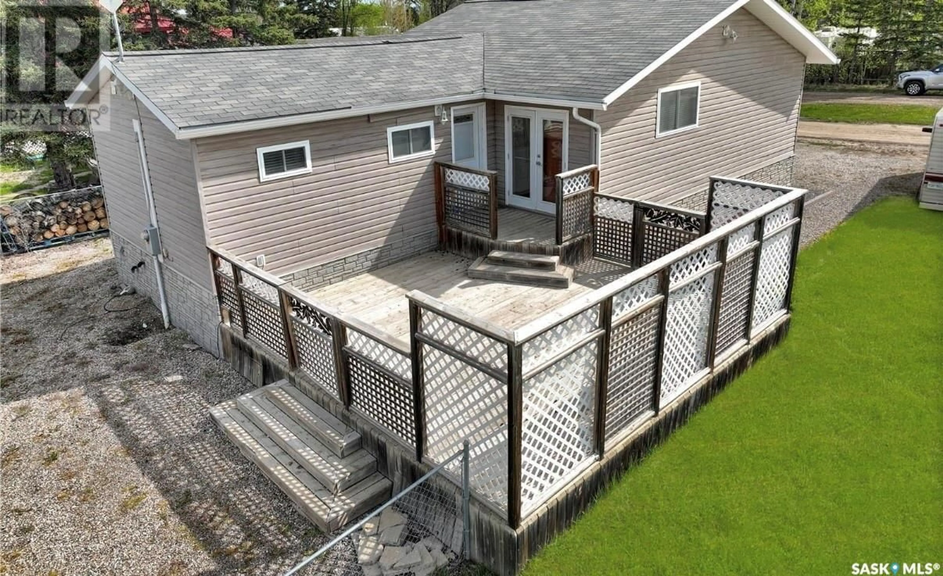 A pic from outside/outdoor area/front of a property/back of a property/a pic from drone, unknown for 502 SOUTHSHORE DRIVE, Emma Lake Saskatchewan S0J0N0